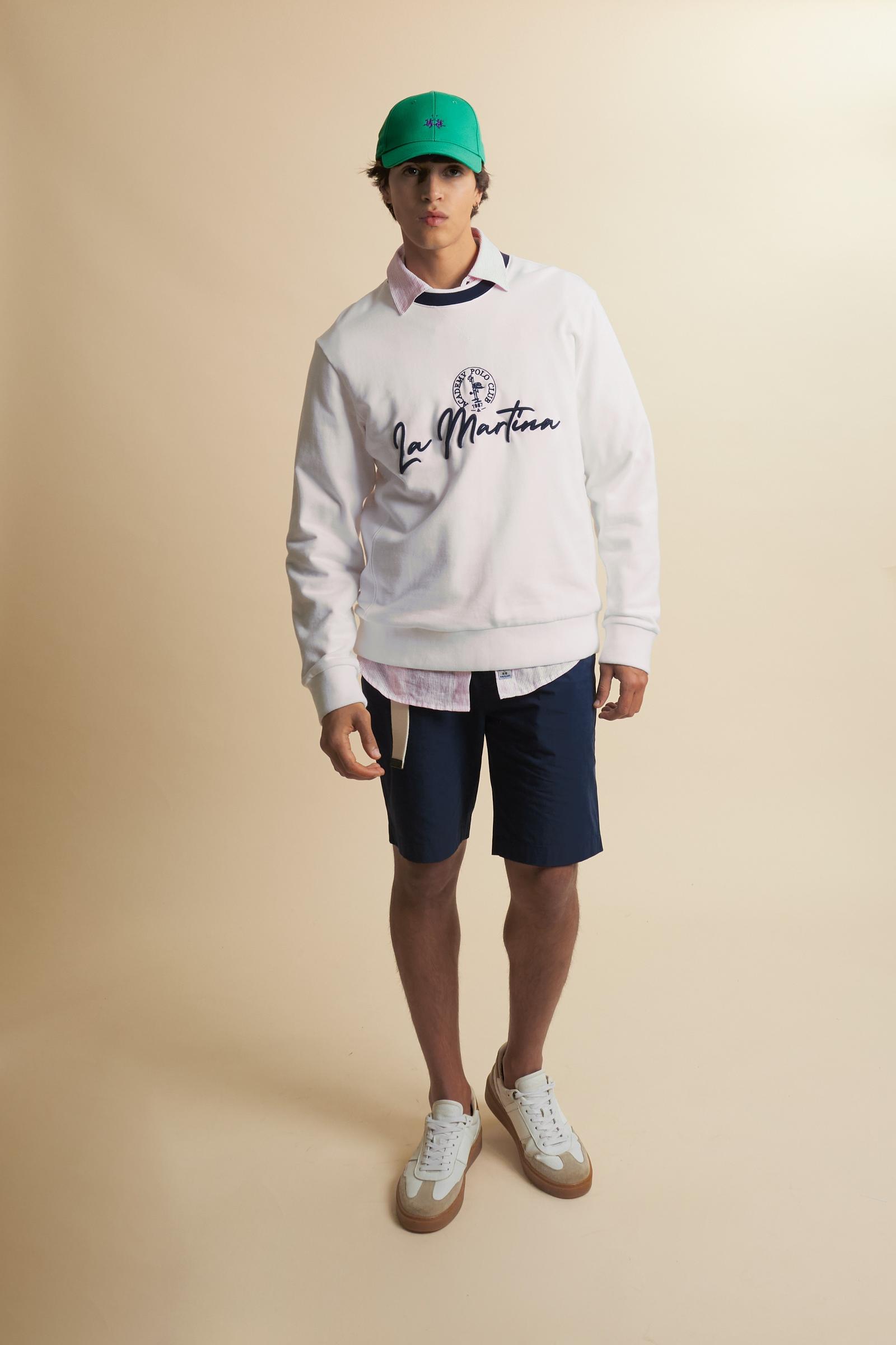 Men’s French Terry sweatshirt with contemporary fit, modern cut and hip-length design. Ribbed trim and contrast embroidery on the chest. - Optic White