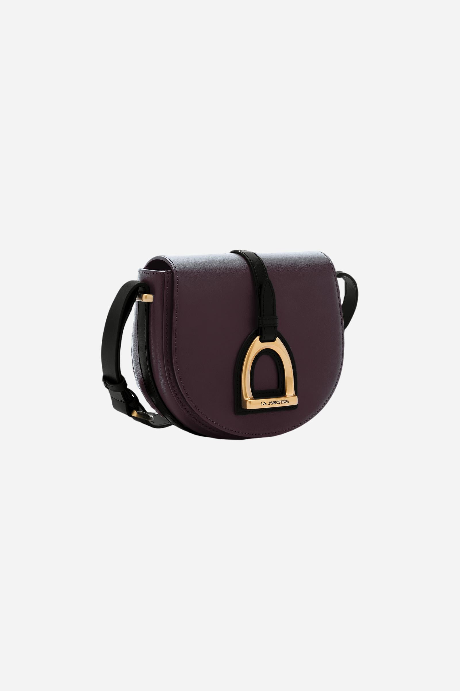 Crossbody bag in calfskin leather with curved design. Finished with flap, large golden buckle and contrasting leather details. - WINE/BLACK