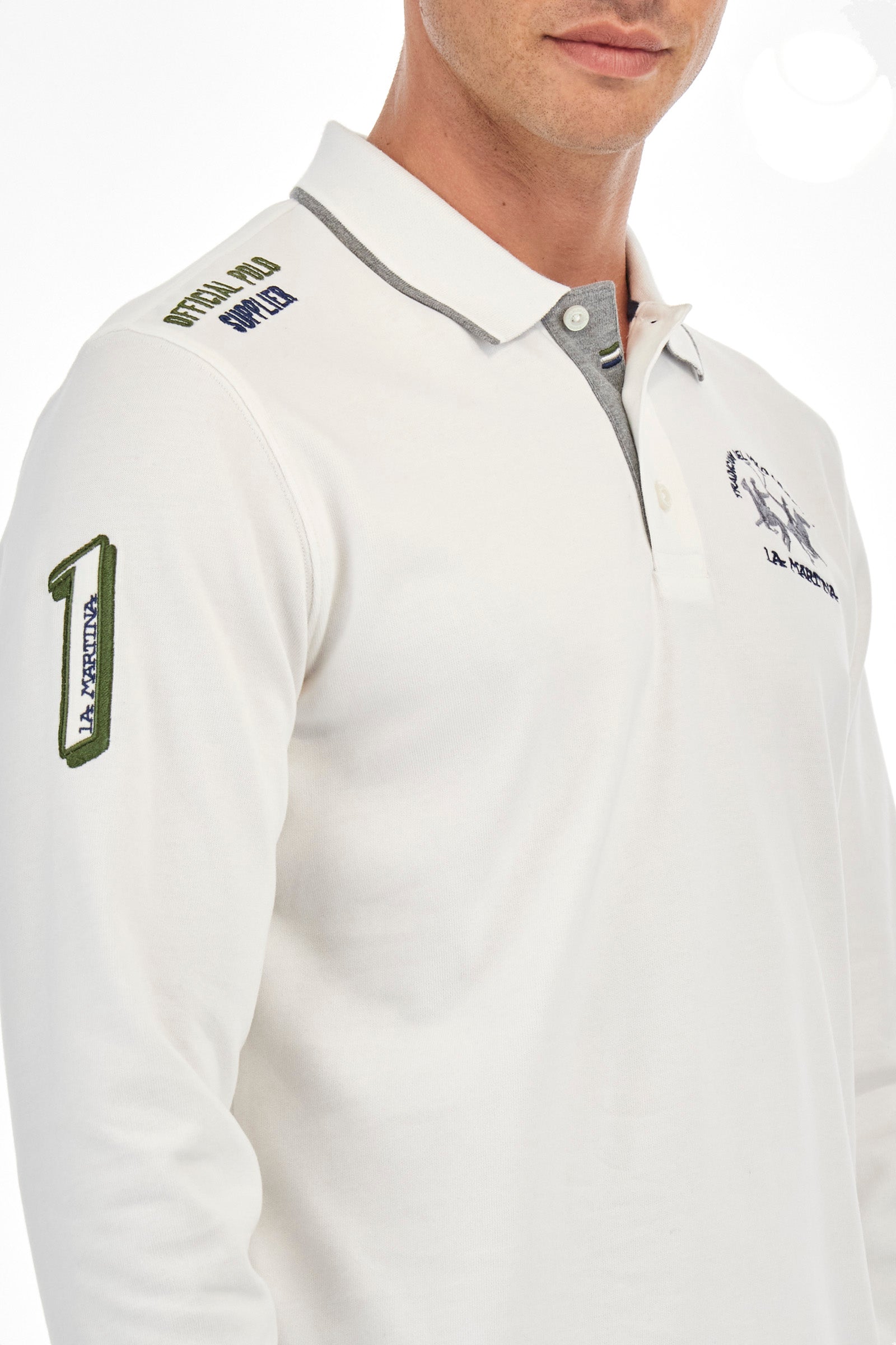 Men's single-colour long-sleeved polo shirt, made from 100% cotton. Three-button fastening. Profiled collar, with the brand's initials underneath. Colour-contrasting cuffs. The garment features all-over lettering and symbols. The logo is embroidered on the front. Regular fit. The model is wearing a size L. - Off White