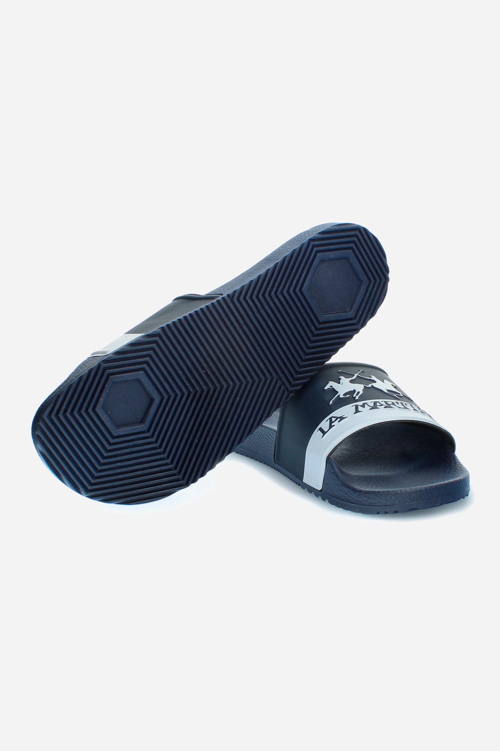 Men's sliders in water-repellent PU for a comfortable and secure fit, and with a non-slip bottom. The band detail with contrasting brand logo gives the sliders a renewed look for a summer must-have. With 'made in Italy' comfort, suitable for the beach and leisure time. - BLUE/WHITE