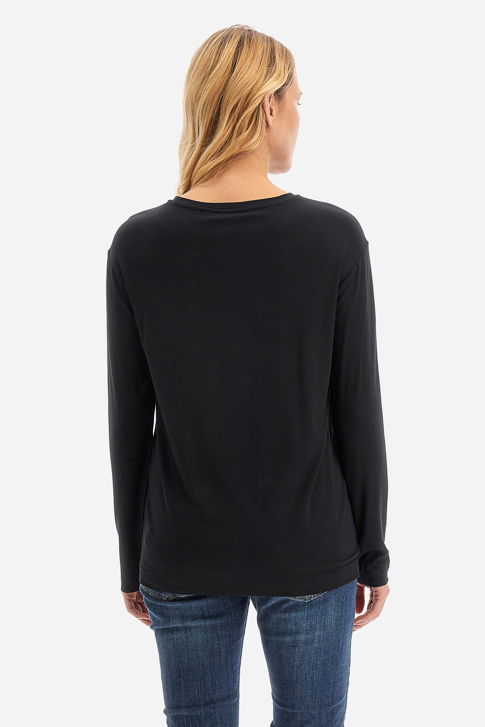 This long-sleeved women's T-shirt is made of stretch viscose for optimal comfort. The regular fit is perfect for any occasion. It features a basic solid colour suitable for any outfit. The crew-neck is enriched with a logo and a jewel detail for a touch of elegance. A versatile and quality garment for every woman's wardrobe. The model is 174 cm tall and wears a size 2. - Black