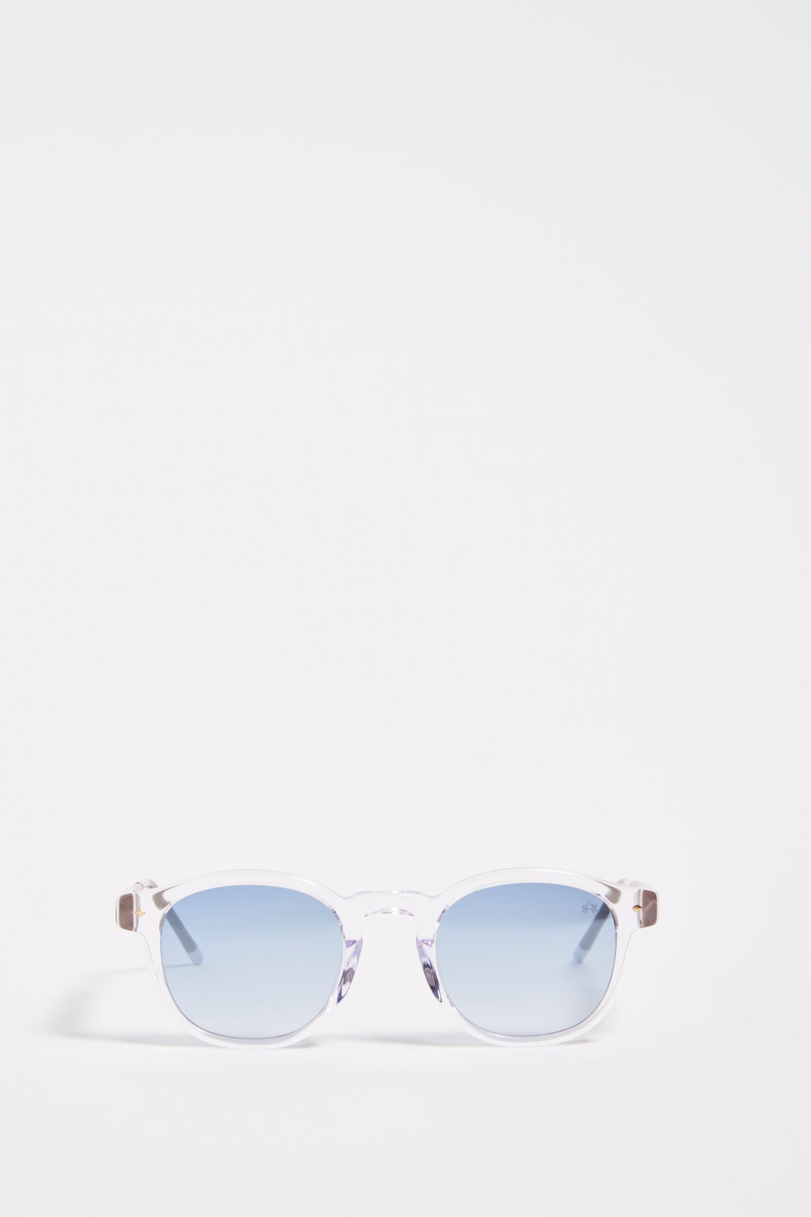 Men's sunglasses, panthos model, or teardrop, in acetate. This classic style accessory features a small La Martina logo on the temple and lenses with internal blue anti-reflection. The details on the end part of the black frame make the glasses particular, allowing them to be worn with any look and always be in fashion. - LIGHT BLUE