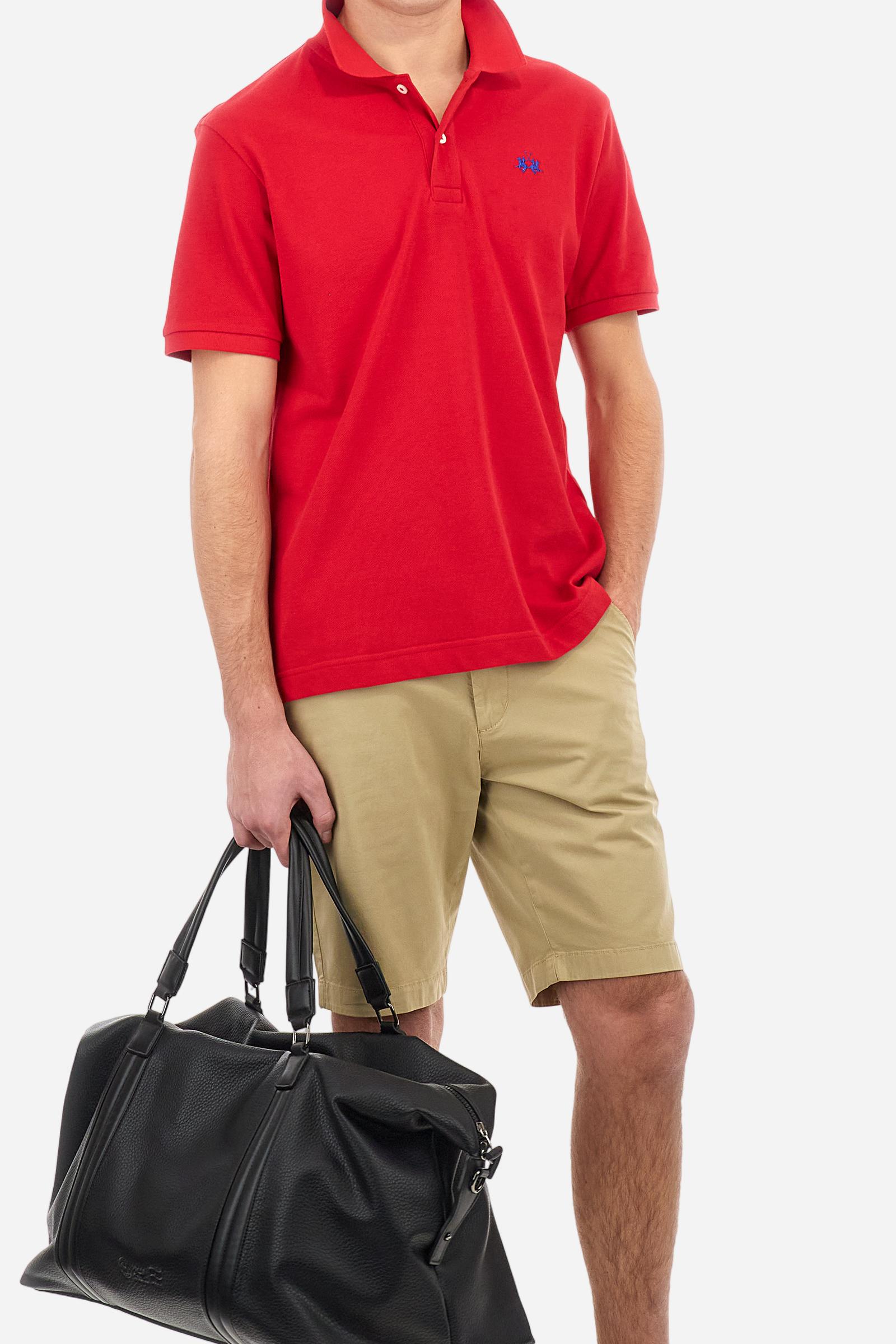 Men's plain-coloured, short-sleeved, regular-fit cotton polo shirt. Contrasting La Martina logo sewn onto the chest. This versatile garment goes perfectly with a pair of jeans from the collection. - Formula One