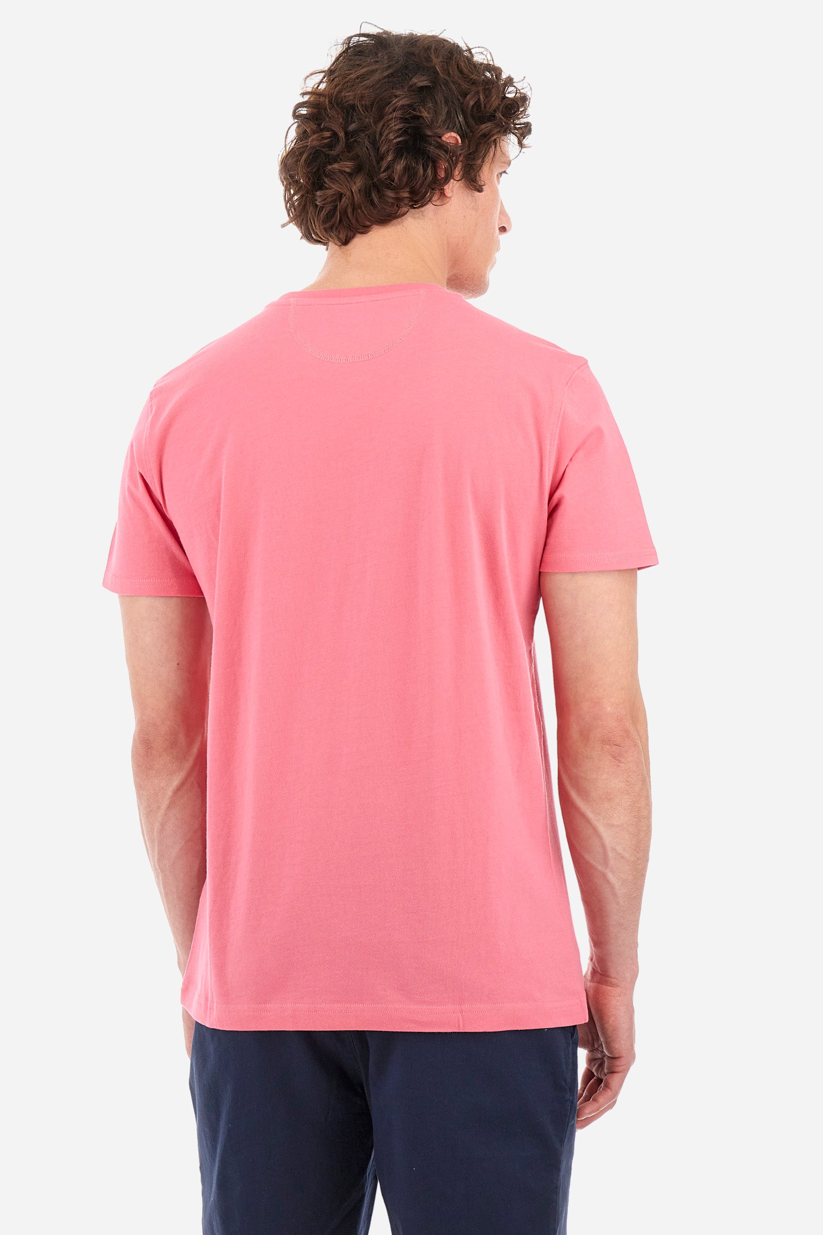 Men's short-sleeved T-shirt with a crew neck in a single colour. Made of 100% cotton. A large logo and the words "La Martina" are printed in contrast on the front. Regular fit. The model wears a size L. - Hot Pink