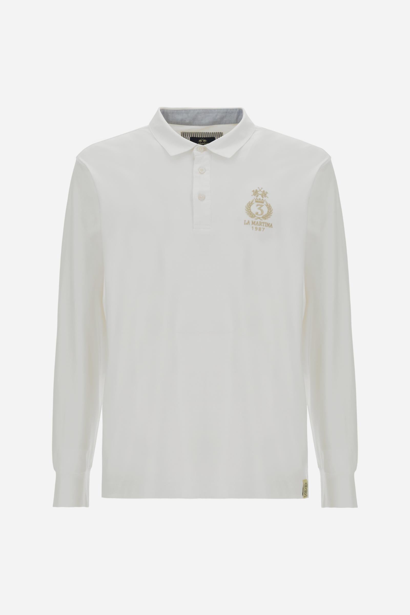 Classic men’s long-sleeve polo in silky 100% cotton jersey, smooth and lightweight to the touch. Three-button placket with contrast details inside the collar. Tone-on-tone ribbed cuffs. Tonal chest print inspired by Polo Club, combined with embroidered undercollar. Discreet logo integrated into the chest graphic. Regular fit. Model wears size L. - Optic White