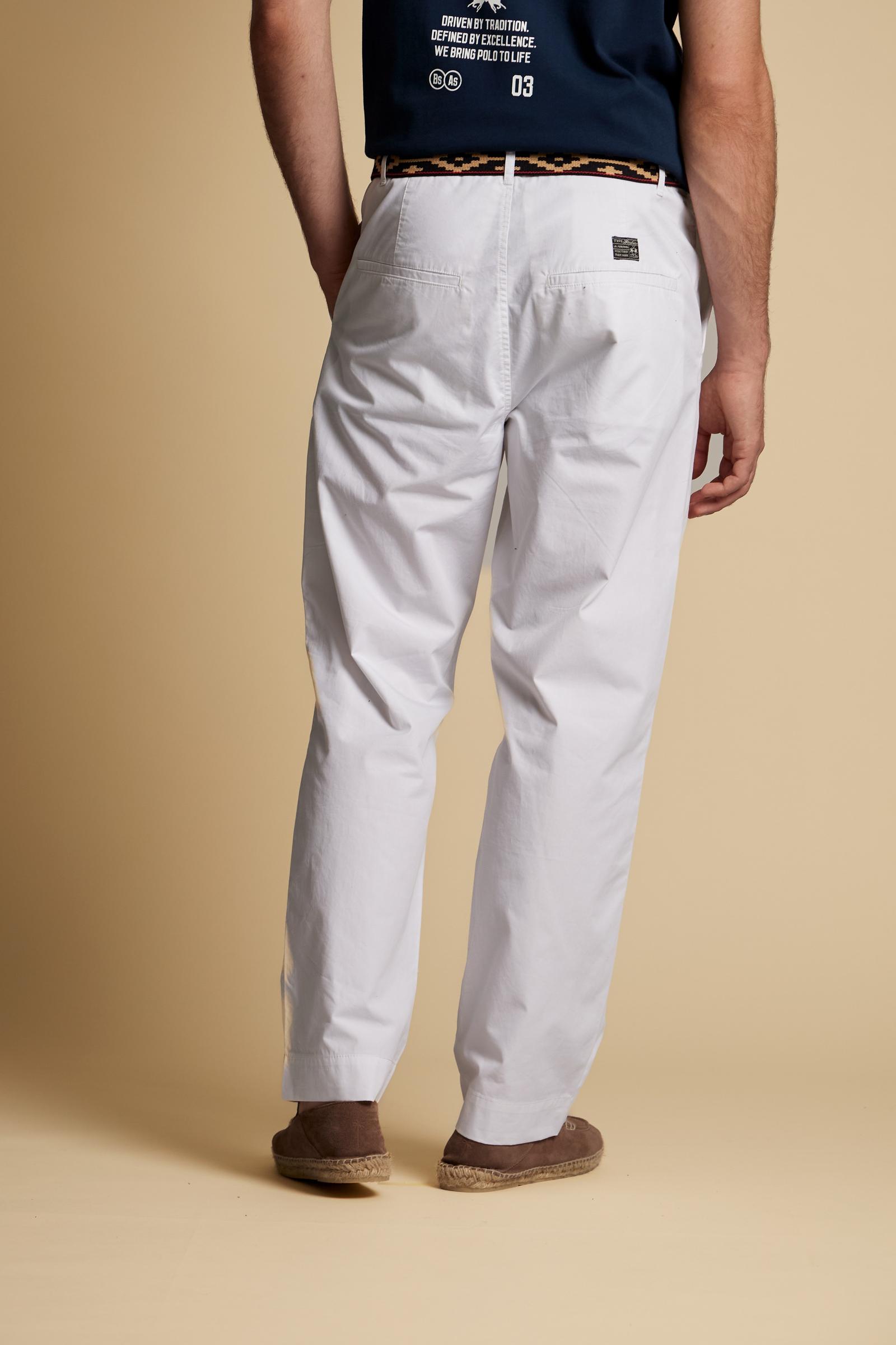 Men’s cotton poplin chino trousers. Clean and versatile design with regular fit, side pockets and discreet logo label at the back. - Optic White
