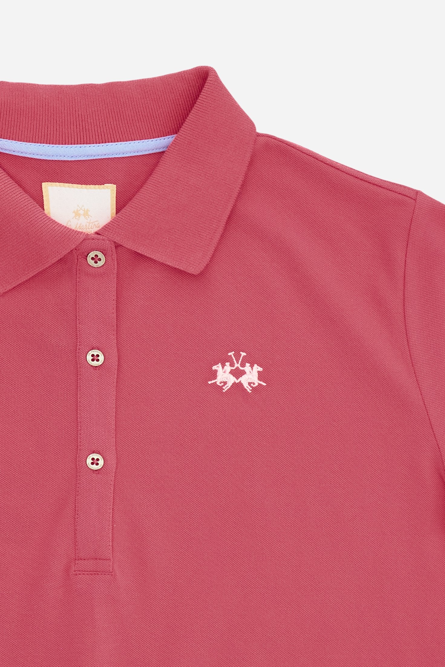 Women’s short-sleeve polo in stretch piqué. Updated regular fit for a more contemporary silhouette. Ribbed collar and cuffs in matching tone, small placket with custom buttons. Brand lettering printed in contrast under the collar and small embroidered logo on the chest. The model wears size 2. - Fandango Pink