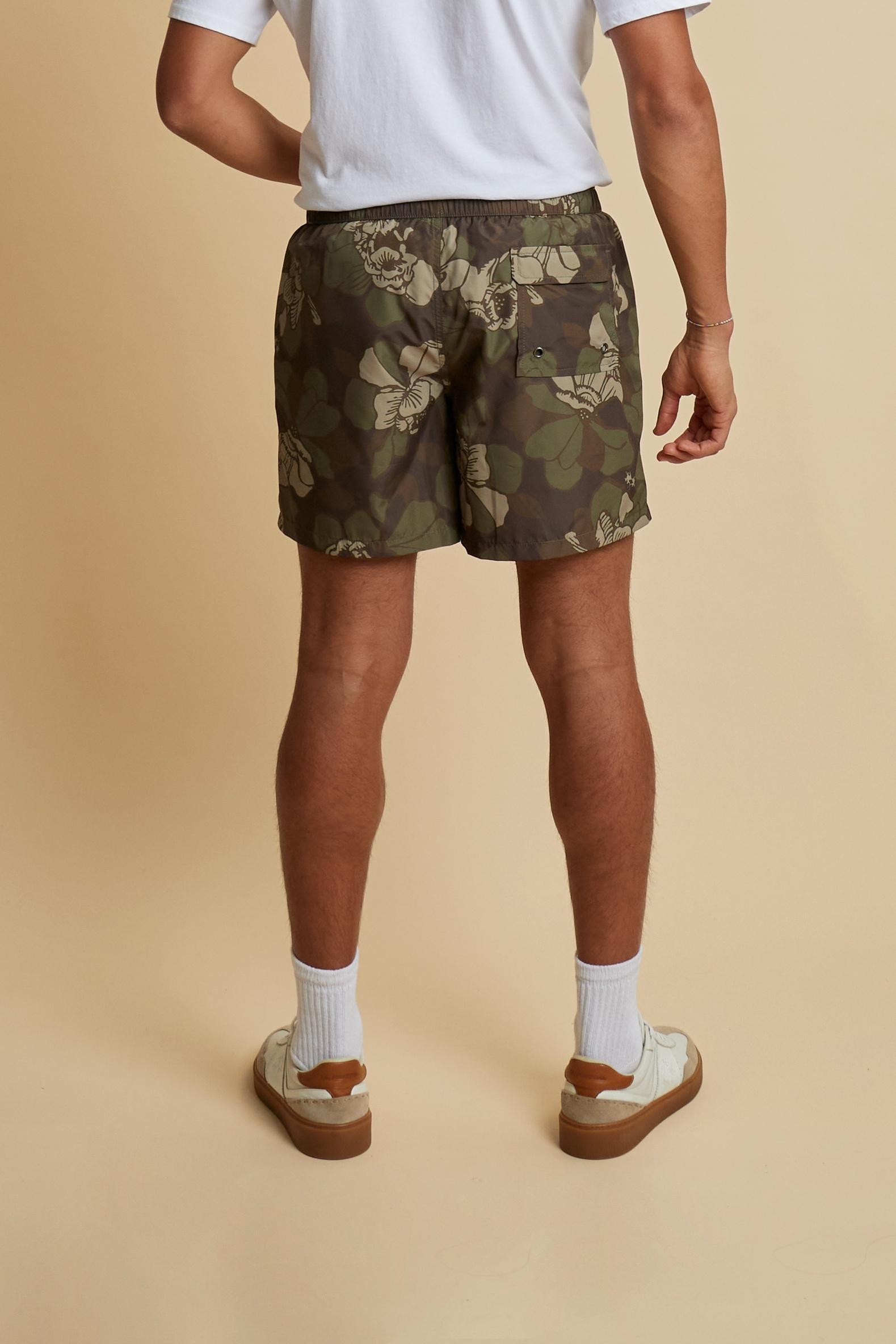 Men’s nylon swim shorts with camouflage print in earthy tones. Regular fit with elasticated waistband, drawstring and embroidered logo. - Wren/Burnt Olive