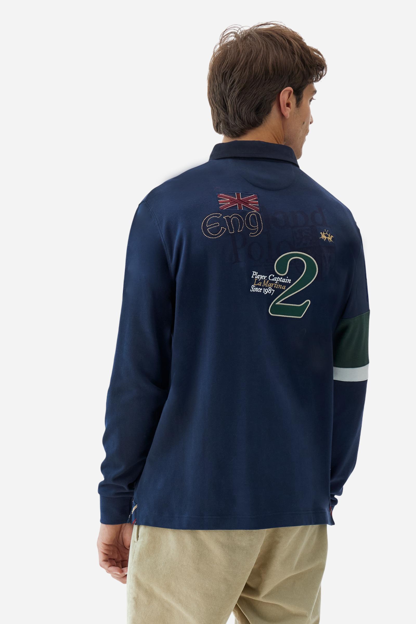 Long-sleeve polo shirt in 100% cotton jersey, soft and warm to the touch. Gabardine collar in tone with a contrast placket for a modern look. The English flag is printed under the raised right collar tip. Contrasting fabric bands and a patch with number 2 decorate the right sleeve, evoking polo player uniforms. Multicolor graphics dedicated to the English team and past special events enrich the design, with a large team logo embroidered in two-tone on the chest. Regular fit. Model wears size L. - Navy