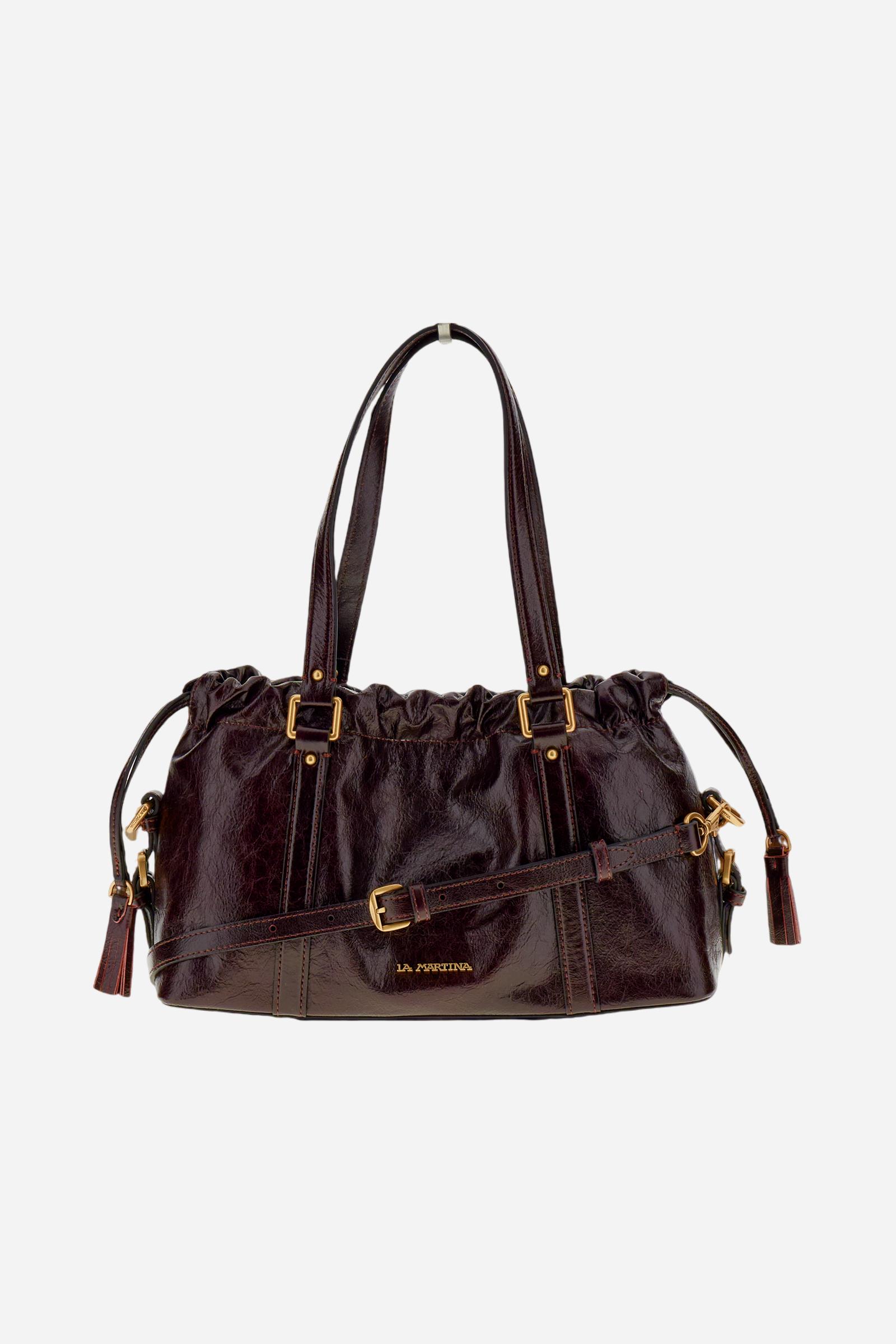 Vintage-finish calfskin tote bag with drawstring closure. Gold-tone details and La Martina logo on the front. - WINE
