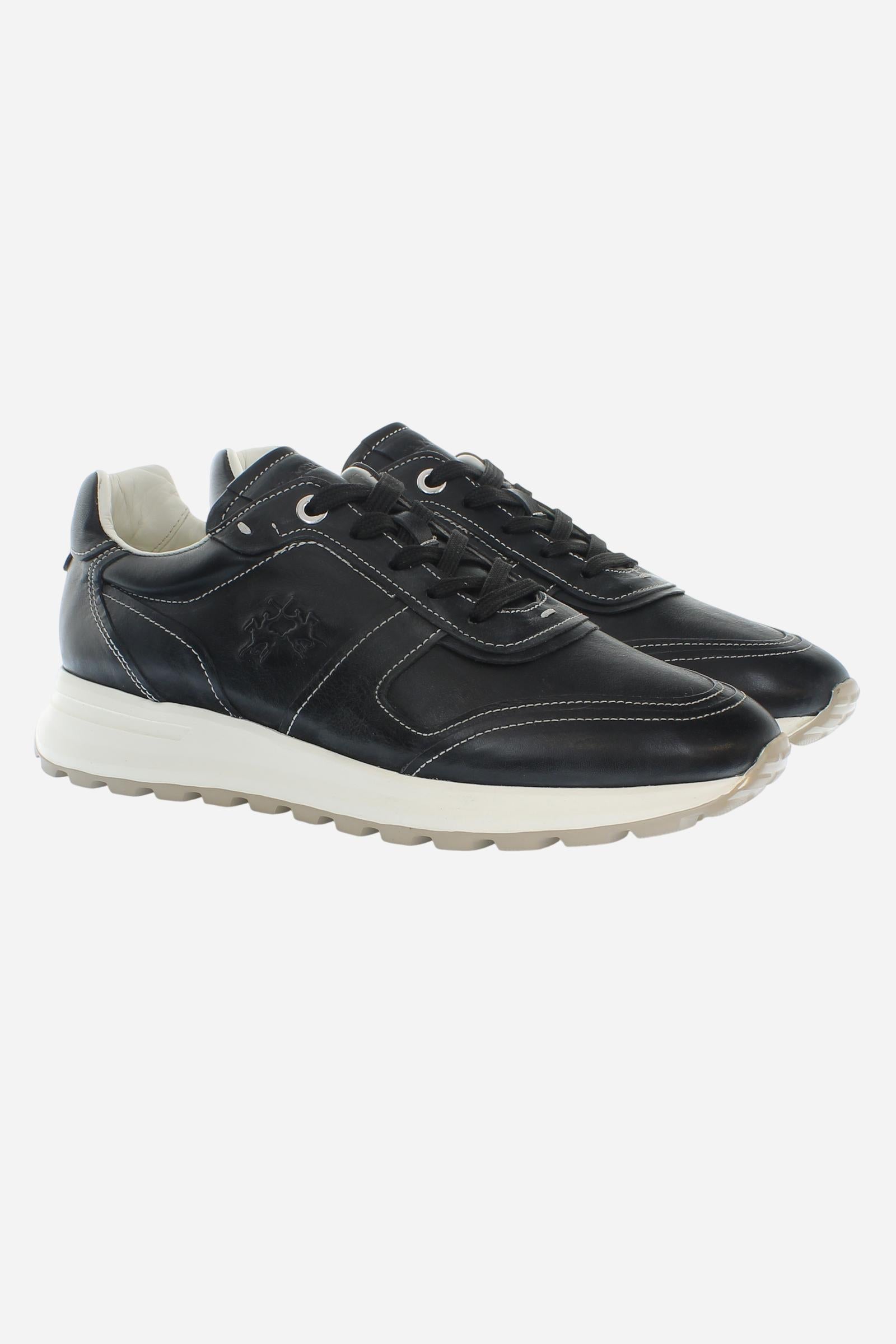 Leather sneakers in cowhide with embossed logos and EVA block sole for maximum comfort. - Black
