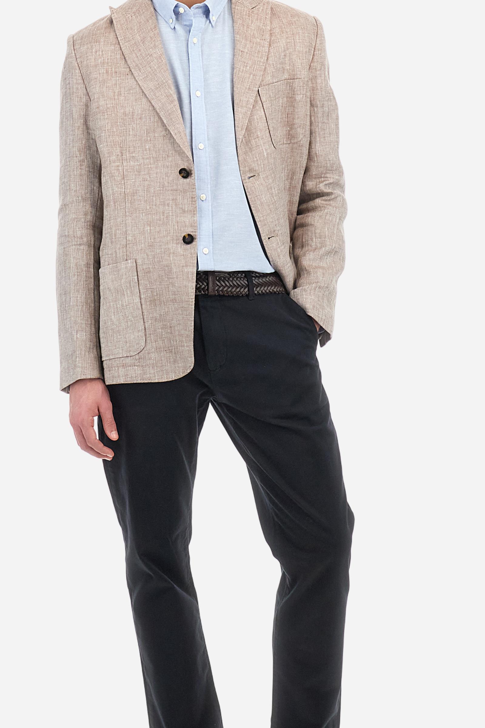 Men's plain long-sleeved shirt made from linen canvas. It features a button-down collar and a basic, traditional design, with woven labels at the bottom of the opening. The logo is embroidered on the chest, over the heart, in tone-on-tone thread. Regular fit. The model is wearing a size L. - Blue Bell