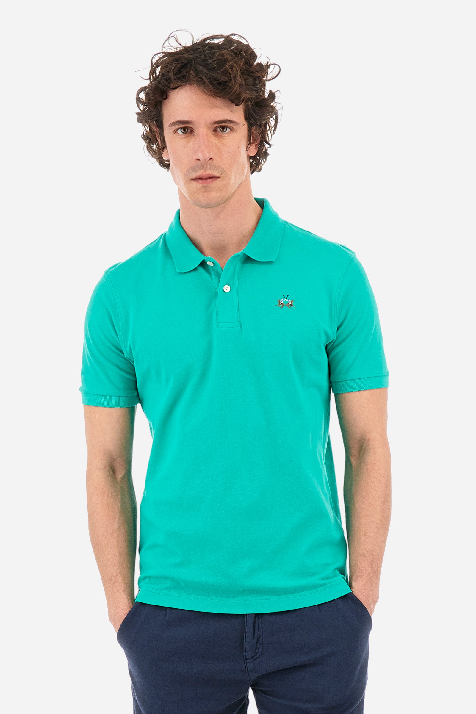 Men's single-colour short-sleeved polo in elasticated cotton. Two-button fastening. Tone-on-tone stitching. Ribbed collar and armholes. The "La Martina" lettering can be found under the collar. Featuring a small logo embroidered on the chest. In a slim fit. The model wears a size L. - Vivid Green