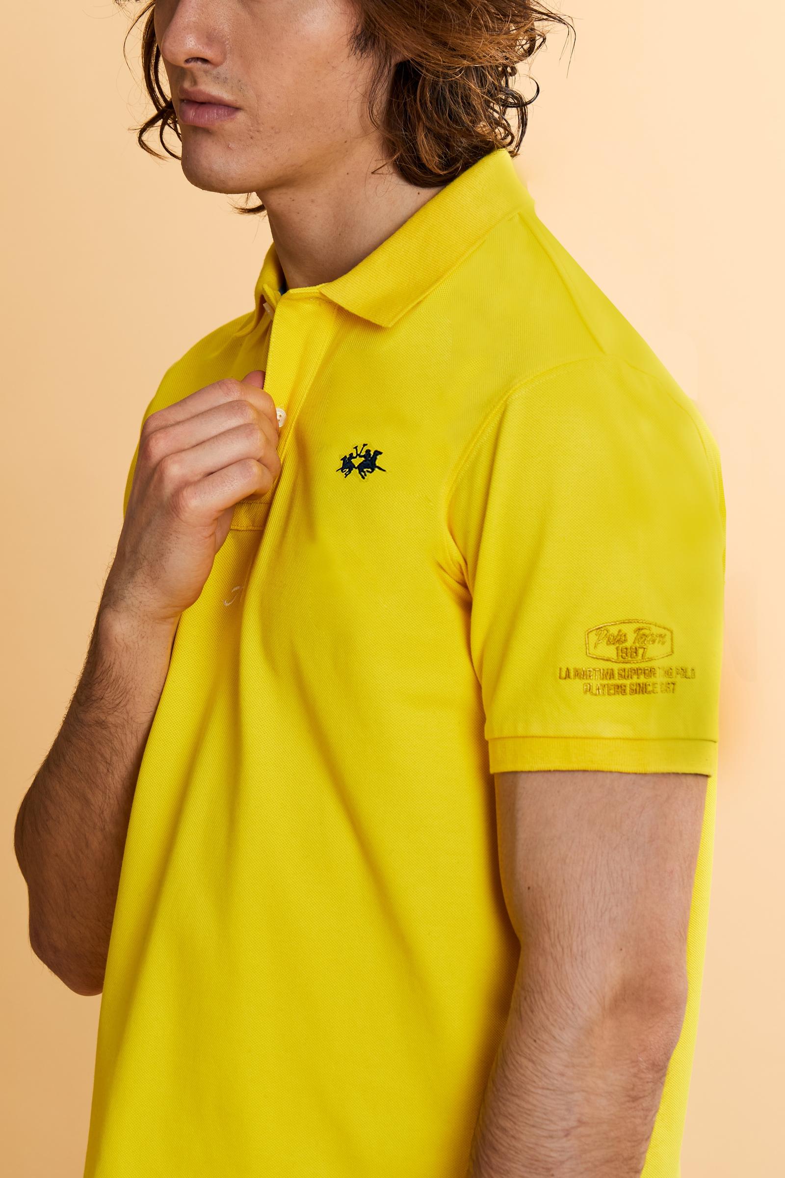Men’s cotton piqué polo with regular fit. Nations collection featuring country-inspired graphics. - Empire Yellow