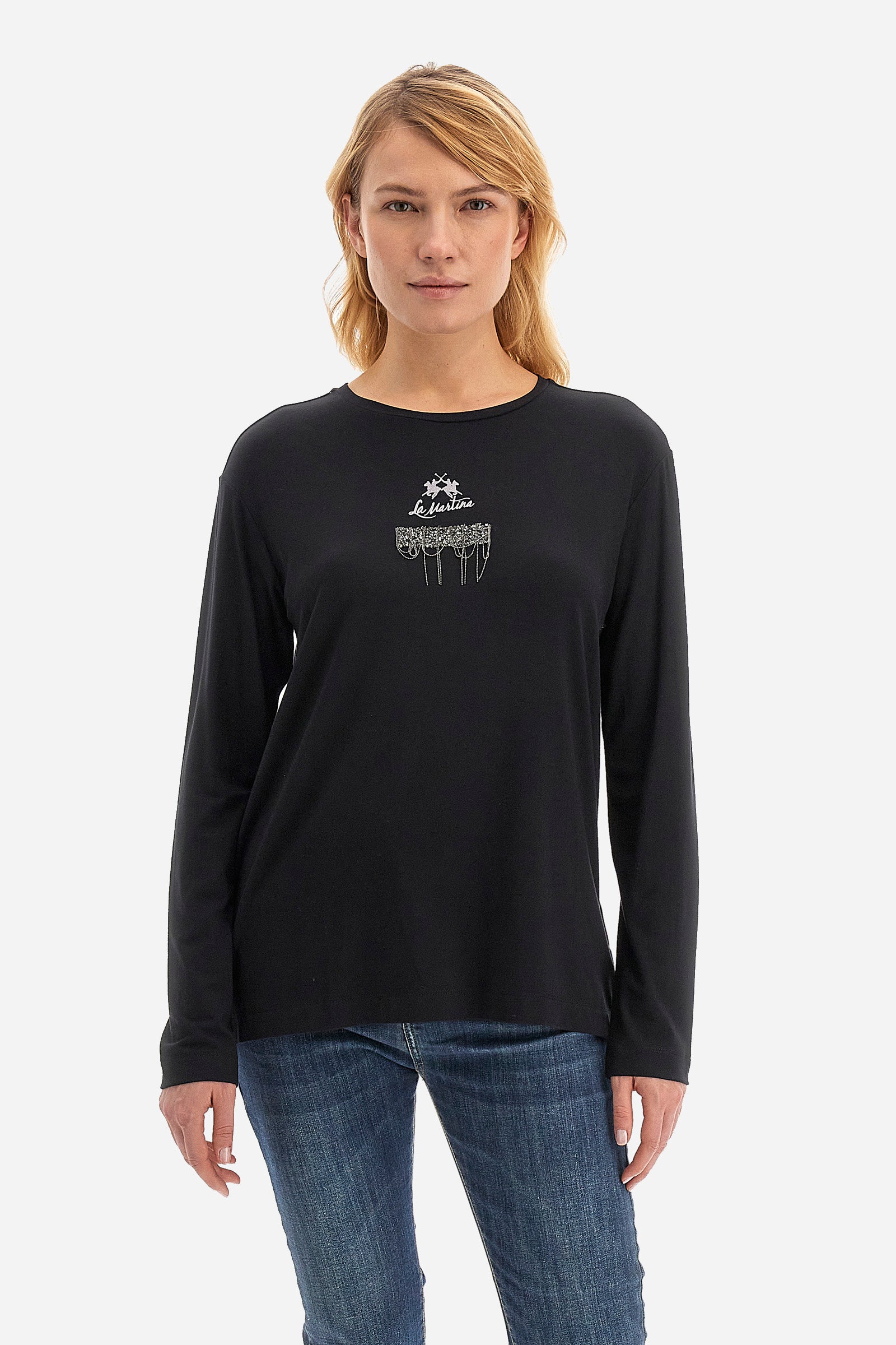 This long-sleeved women's T-shirt is made of stretch viscose for optimal comfort. The regular fit is perfect for any occasion. It features a basic solid colour suitable for any outfit. The crew-neck is enriched with a logo and a jewel detail for a touch of elegance. A versatile and quality garment for every woman's wardrobe. The model is 174 cm tall and wears a size 2. - Black