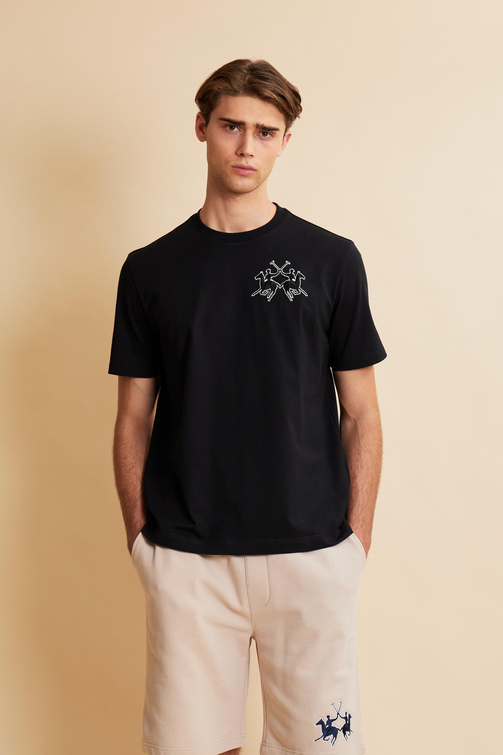 T-shirt in heavy cotton jersey with a structured, boxy fit. Dropped shoulders and clean lines. Large contrasting 3D embroidered logo on the chest. - Black