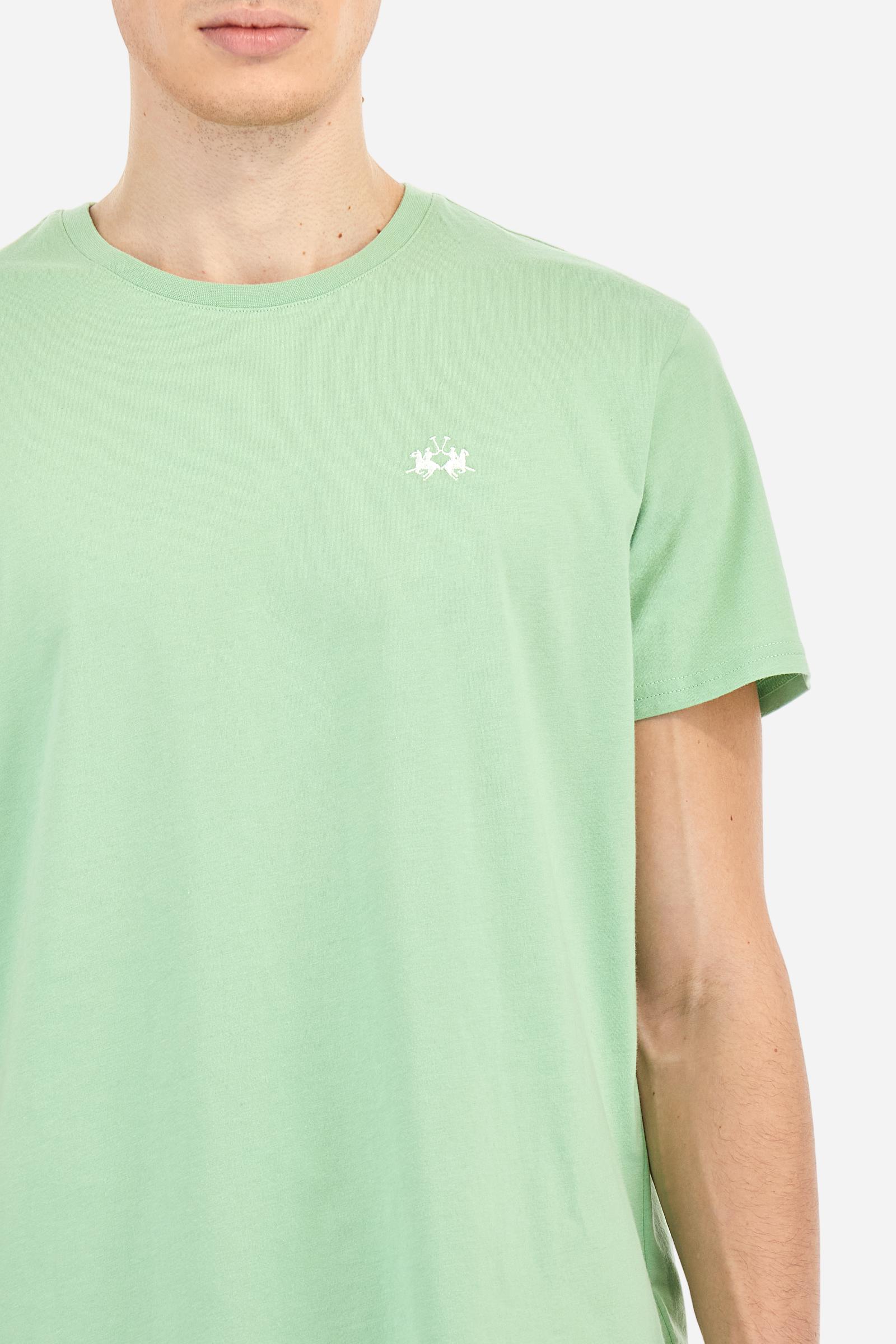 Men's short-sleeved crew-neck T-shirt in solid colour with embroidered logo in contrasting colour on the chest. Made of 100% cotton with a regular fit. It is perfect paired with Bermuda shorts or trousers for a casual and trendy look. Suitable for leisure time. The model is 187 cm tall and wears a size L. - Pastel Green