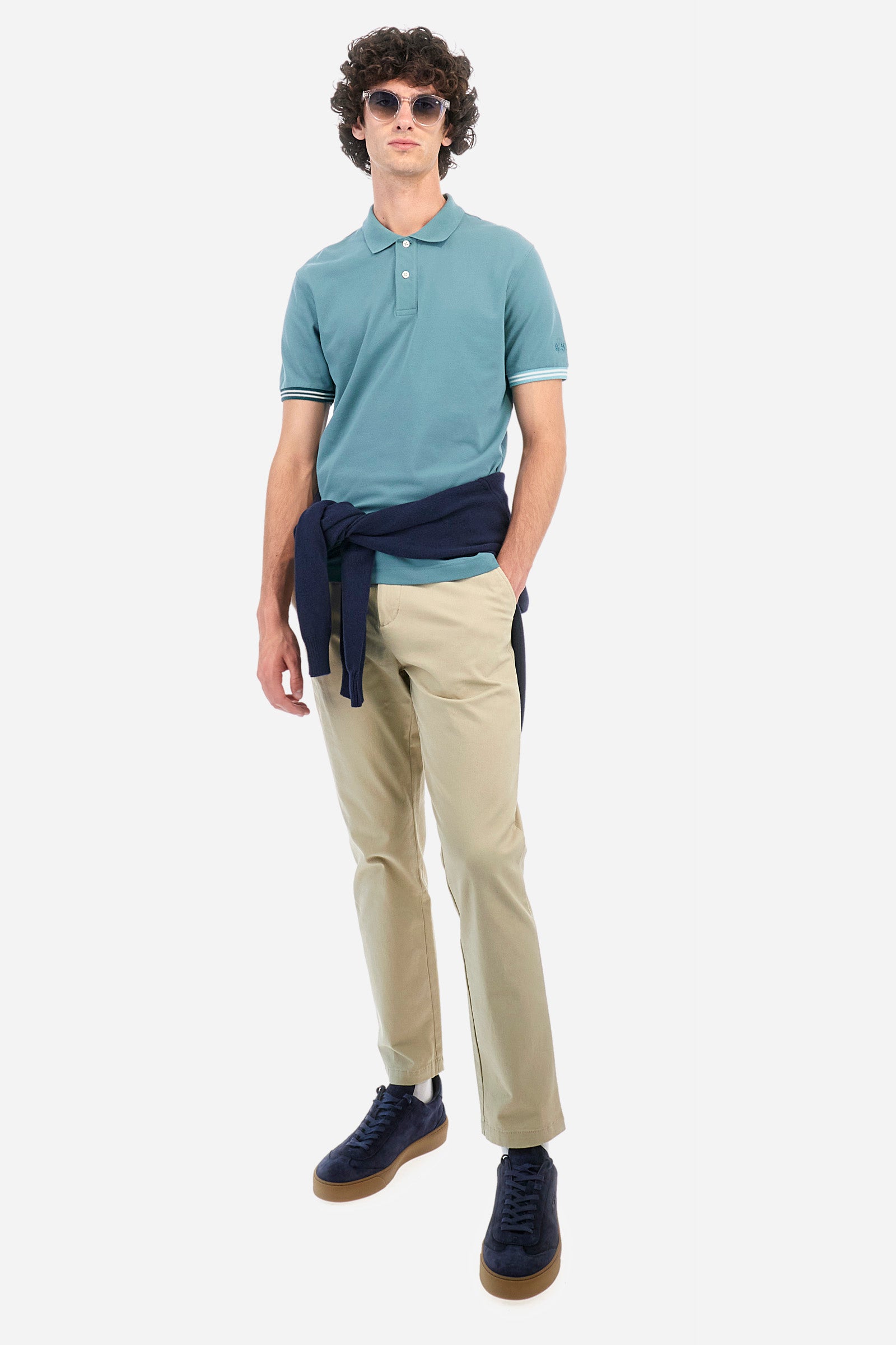 Men's short-sleeved polo shirt in plain stretch cotton. Two-button fastening. The logo is embroidered on one of the sleeves. Regular fit. The model is wearing a size L. - Arctic
