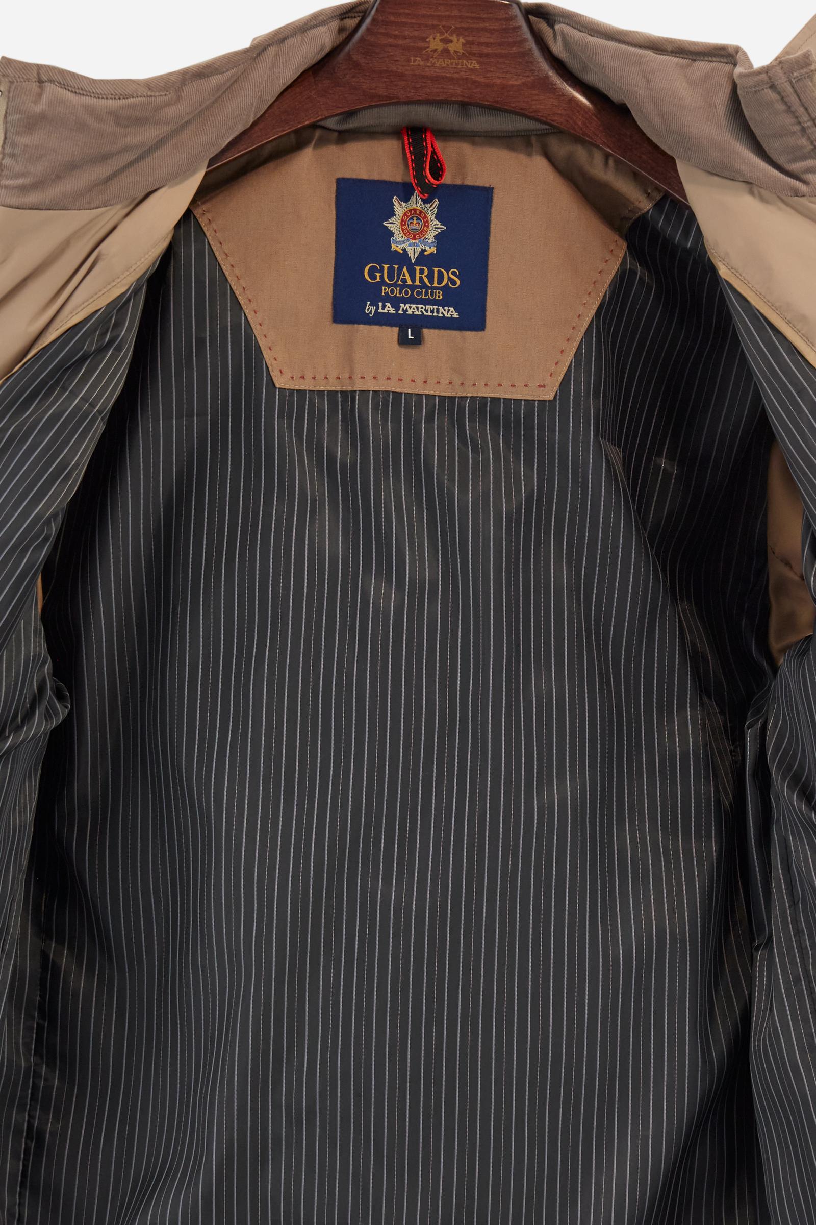 Men’s quilted nylon husky jacket with high collar. Front closure with customized zip and large faux-leather buttons. Interior lined with striped bicolor polyester. Contrast details on the inside (pockets, profiles, back-neck tab). Clean design with chest pocket closed by zip and vertical side pockets. Adjustable back straps with metal snap buttons. Logo patches on the sleeves and multicolor embroidered lettering on the outer collar. Part of the Guards capsule. Regular fit. Model wears size L. - Moon Rock