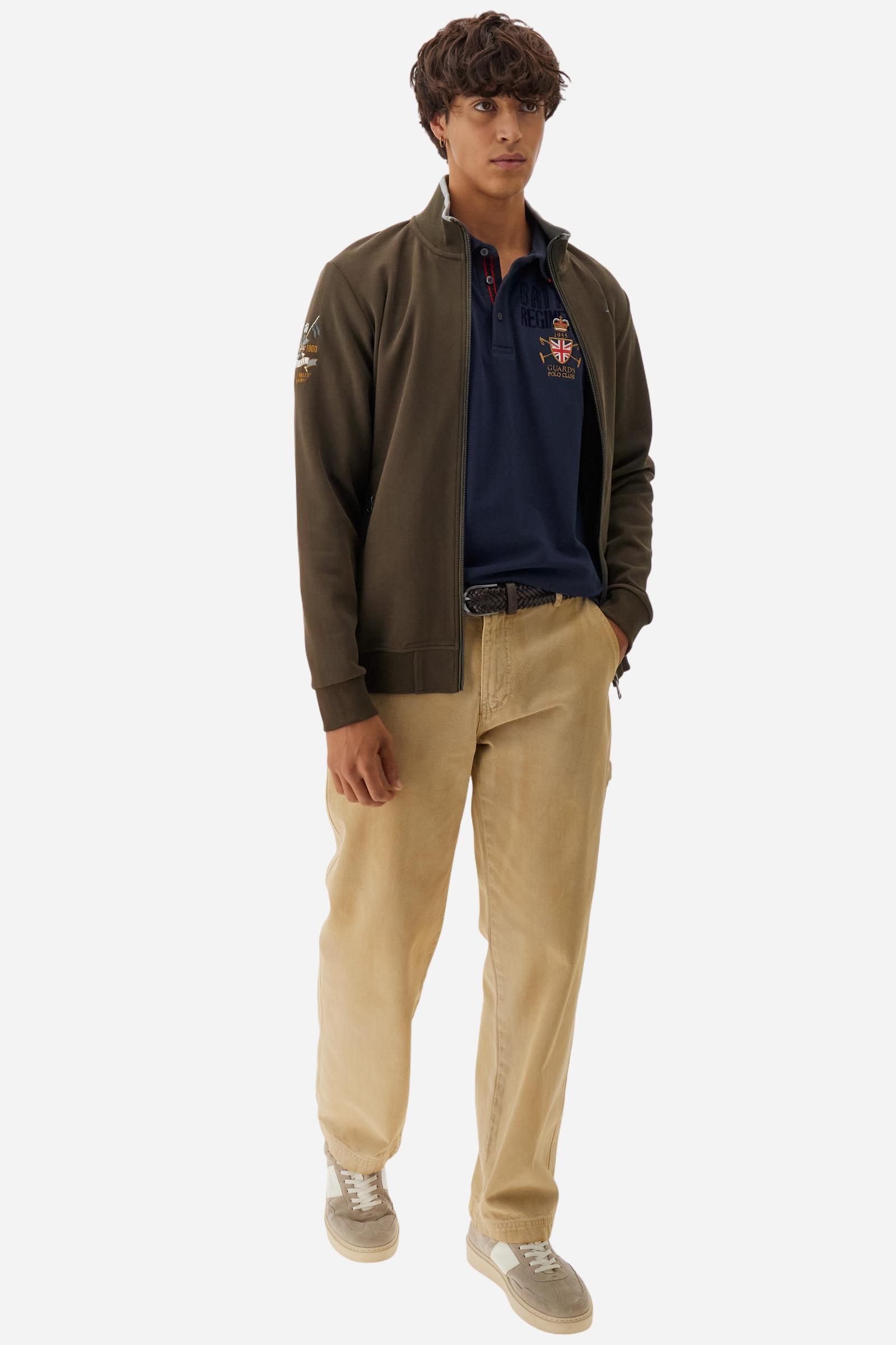 Short-sleeve polo shirt from the Guards capsule, made of high-quality stretch cotton piqué. Ribbed collar and cuffs in matching tone, with contrast striped detail on the collar. Three-button personalized placket. Multicolor graphics, patches, and lettering celebrate the British regiment, applied to chest and sleeves. Brand logo embroidered in contrast on the left sleeve. Regular straight fit. Model wears size L. - Navy