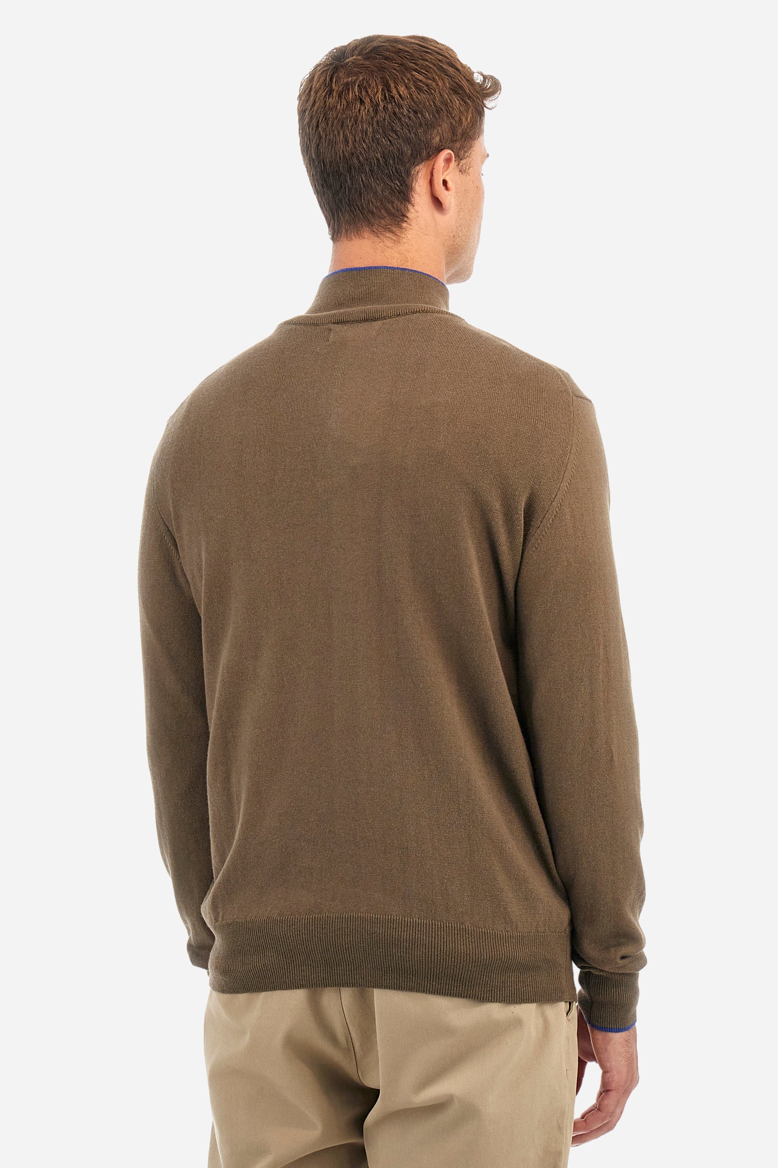 Men's plain mock polo neck pullover with long sleeves. Trimmed collar with a half zip, made from ribbed fabric to match the cuffs and hem. Made from a blend of cotton and wool. Featuring a small embroidered logo on the front. Regular fit. The model is wearing a size L. - Beech