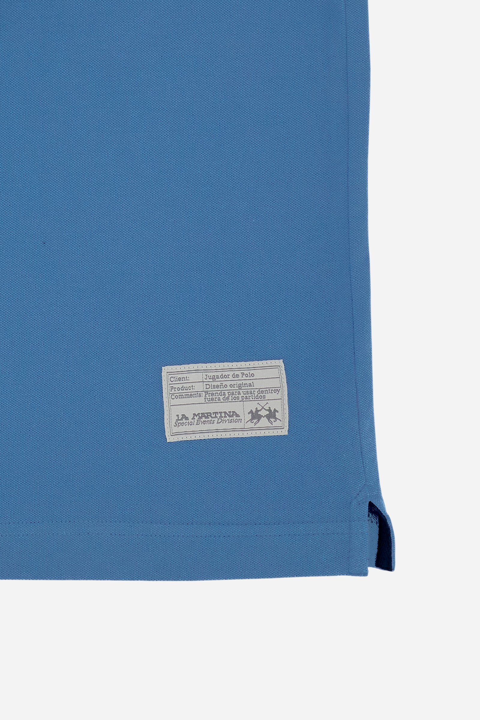 Men's short-sleeve polo shirt made from solid-color stretch piqué fabric. The model features a two-button front placket with ribbed collar and cuffs in matching tone. An iconic design of the brand, it stands out for the large embroidered team logo in contrasting color on the chest and the bold brand print under the collar in contrasting color. The regular fit ensures comfort and versatility for everyday wear. The model is wearing size L. - Riviera