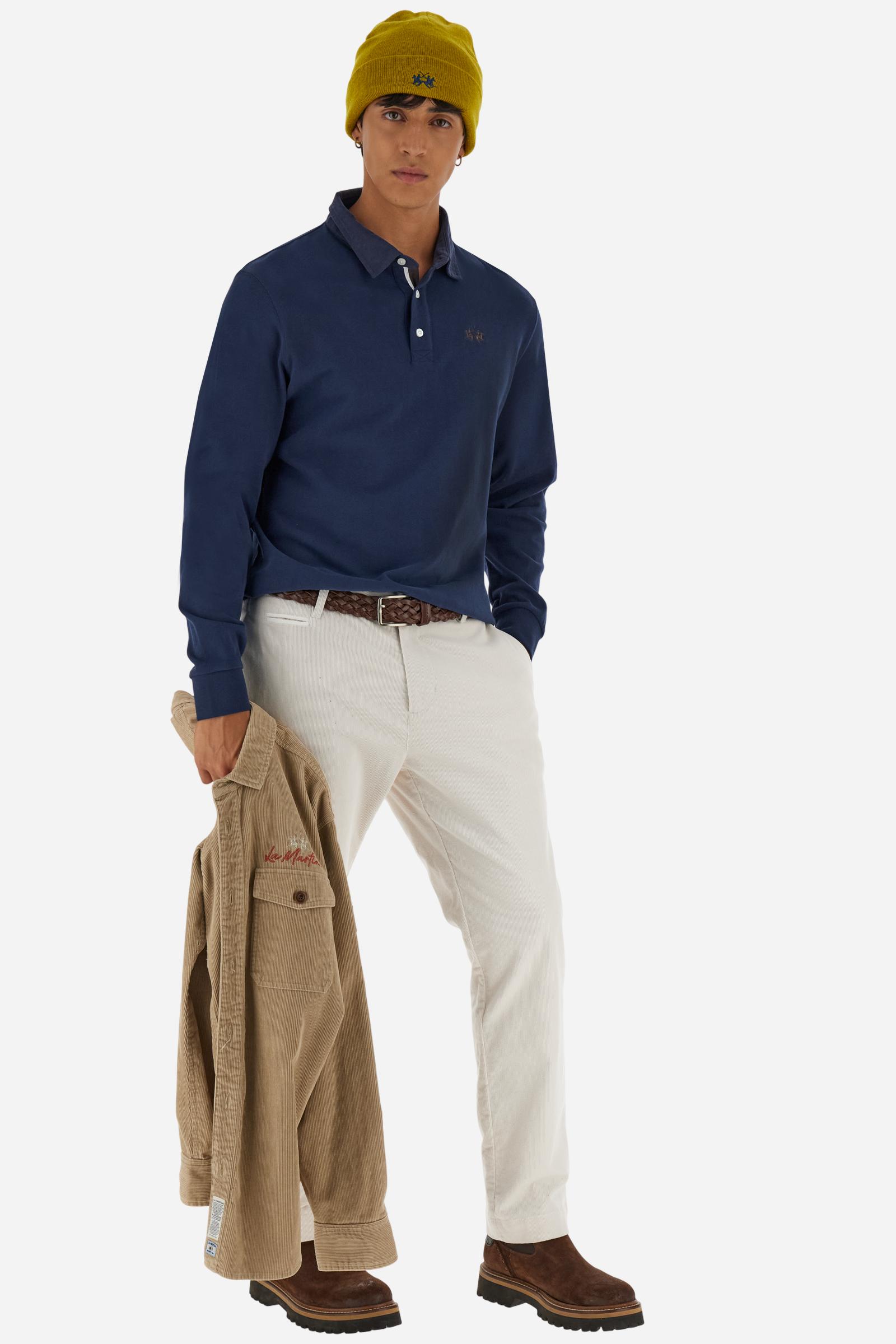 Classic men’s long-sleeve polo in soft-touch 100% cotton jersey. Contrast gabardine collar, three-button placket with multicolor striped tape. Iconic La Martina lettering printed in contrast under the collar. Small contrast logo embroidered on the chest. Regular fit for a balanced silhouette. Model wears size L. - Navy