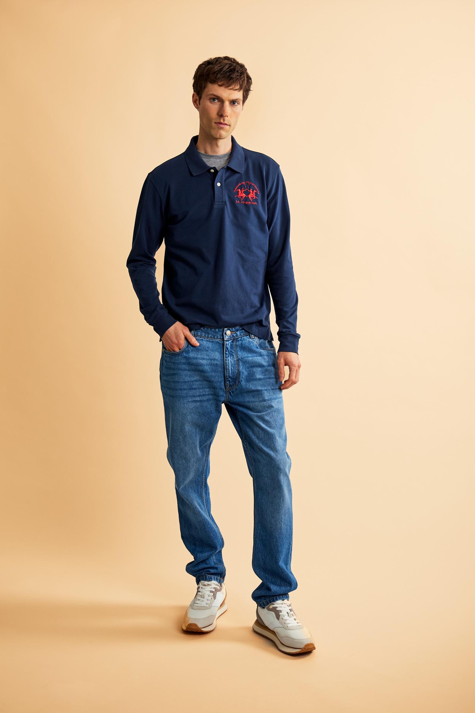 Five-pocket jeans in stretch cotton denim with branded rivets and button. Regular waist and slim leg. Embroidered logo on coin pocket and branded label on the back. - Medium Indigo Denim
