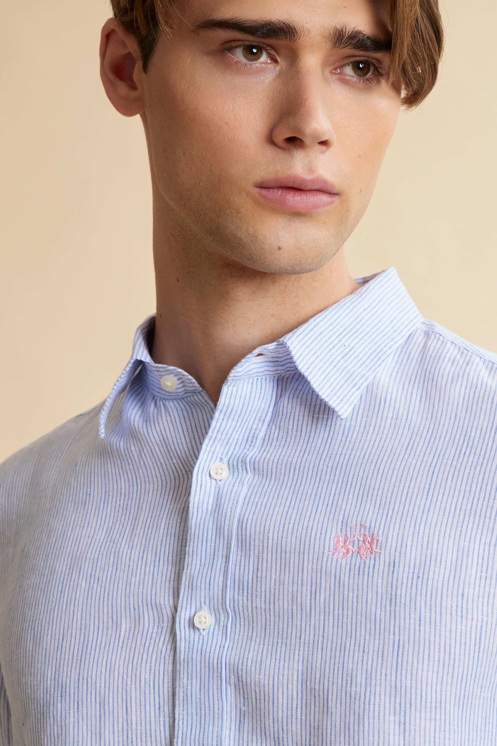 Shirt in 100% linen with vertical micro stripes and natural slub texture. Regular fit that follows the body. Embroidered logo on the chest and signature details on the placket. - OptWhitePrincessBlue