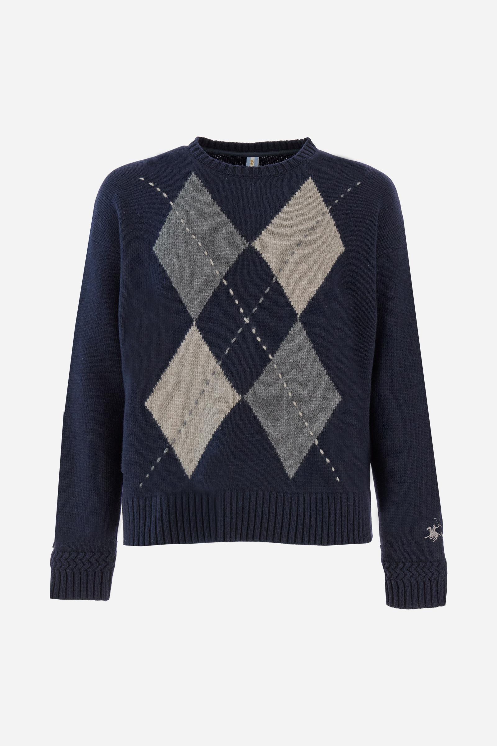Men’s crew-neck sweater with long sleeves in high-quality wool blend. Ribbed collar, cuffs and hem with zigzag detail at sleeve attachment. Argyle motif on the front and contrast embroidered logo on the cuff. Regular fit with dropped shoulders for a contemporary look. The model wears size L. - Navy