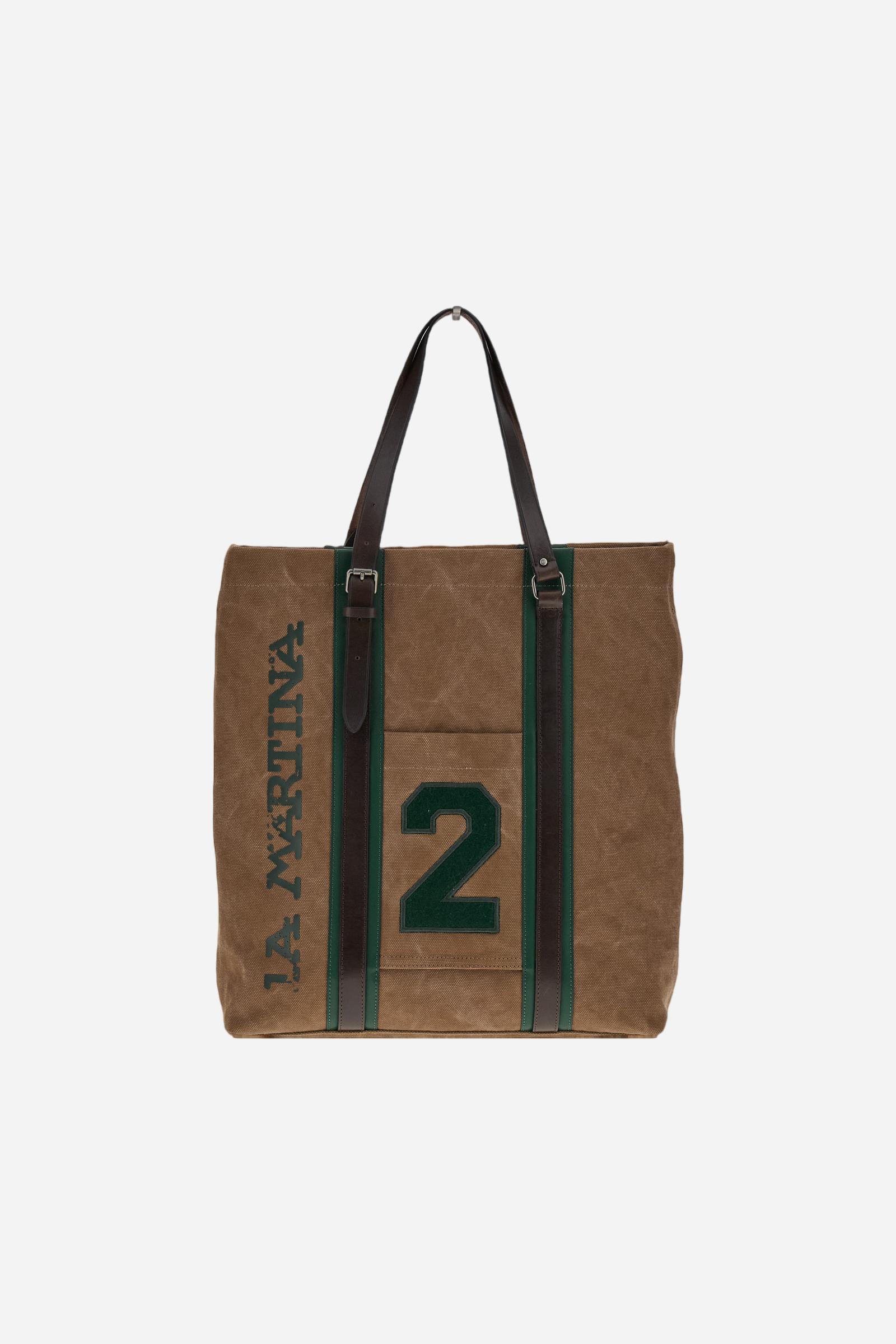 Tote bag in washed cotton with smooth leather details, versatile and roomy, ideal for everyday use. Featuring leather handles and a front pocket with patch, it is enriched with vertical logo print and contrasting bands that give a distinctive character. Dimensions:39 x 10 x 35 - COCOA/PINE NEEDLE