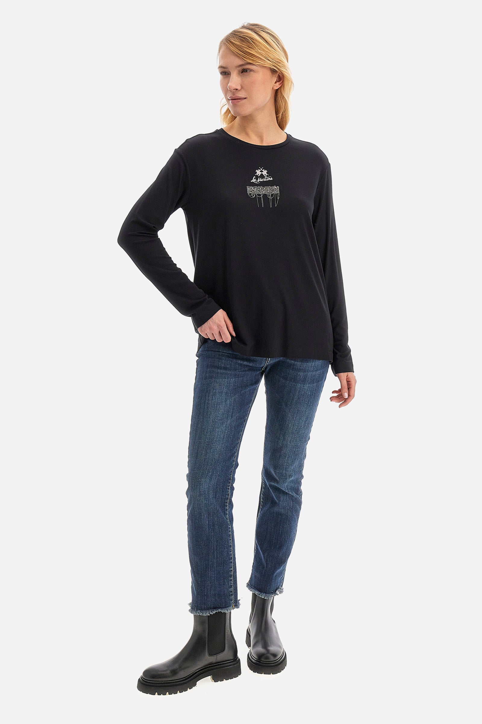 This long-sleeved women's T-shirt is made of stretch viscose for optimal comfort. The regular fit is perfect for any occasion. It features a basic solid colour suitable for any outfit. The crew-neck is enriched with a logo and a jewel detail for a touch of elegance. A versatile and quality garment for every woman's wardrobe. The model is 174 cm tall and wears a size 2. - Black