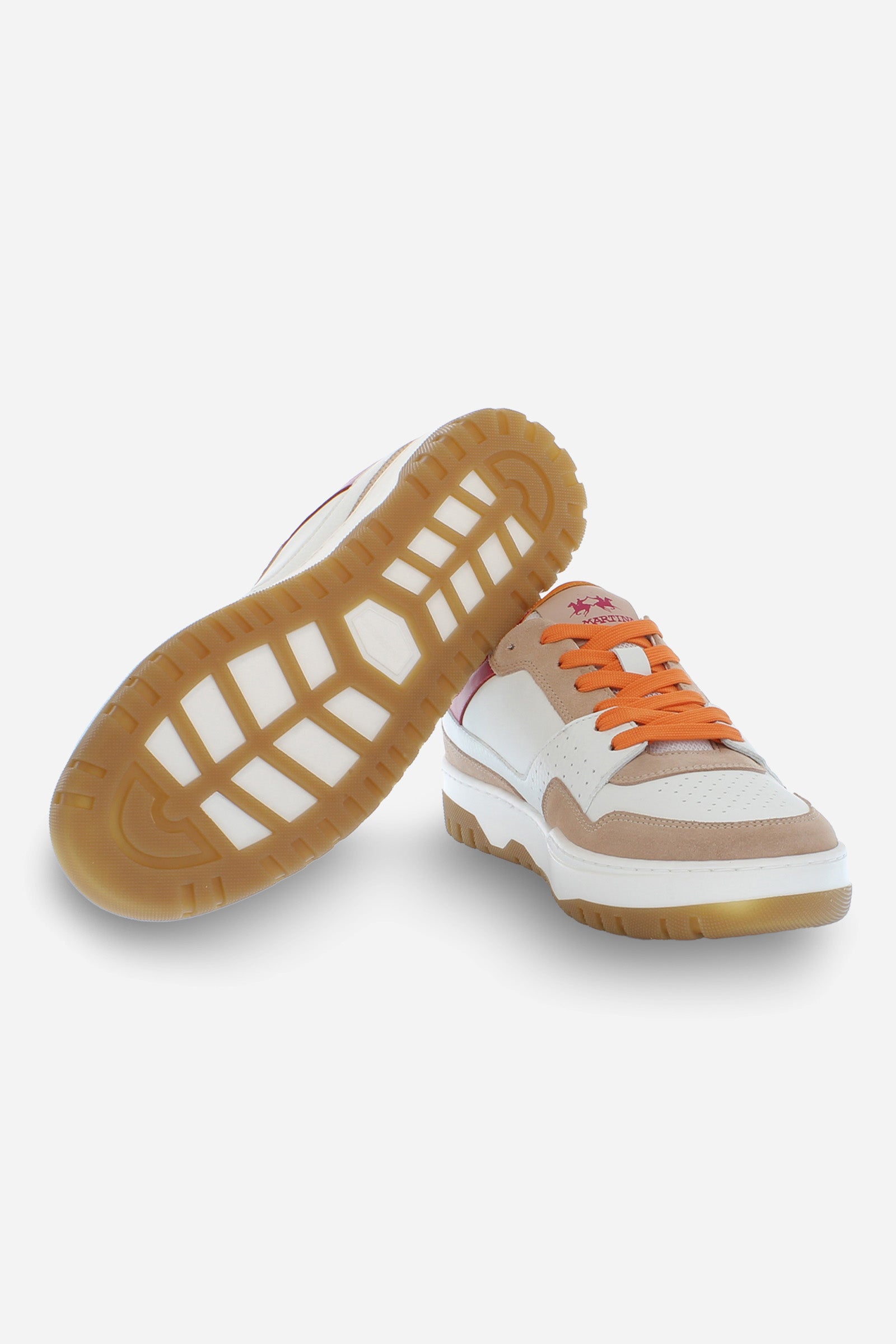 New vintage project trainer in soft, vegetable-tanned leather, with tone-on-tone and vividly coloured suede inserts to add a touch of visual interest. Iconic perforated motif and technical fabric inserted for greater lightness. Padded tongue covered in leather with fabric insert with embroidered La Martina branding. Logo print on the back patch. Oversized cushioned sole in two-tone rubber. - Pink/White