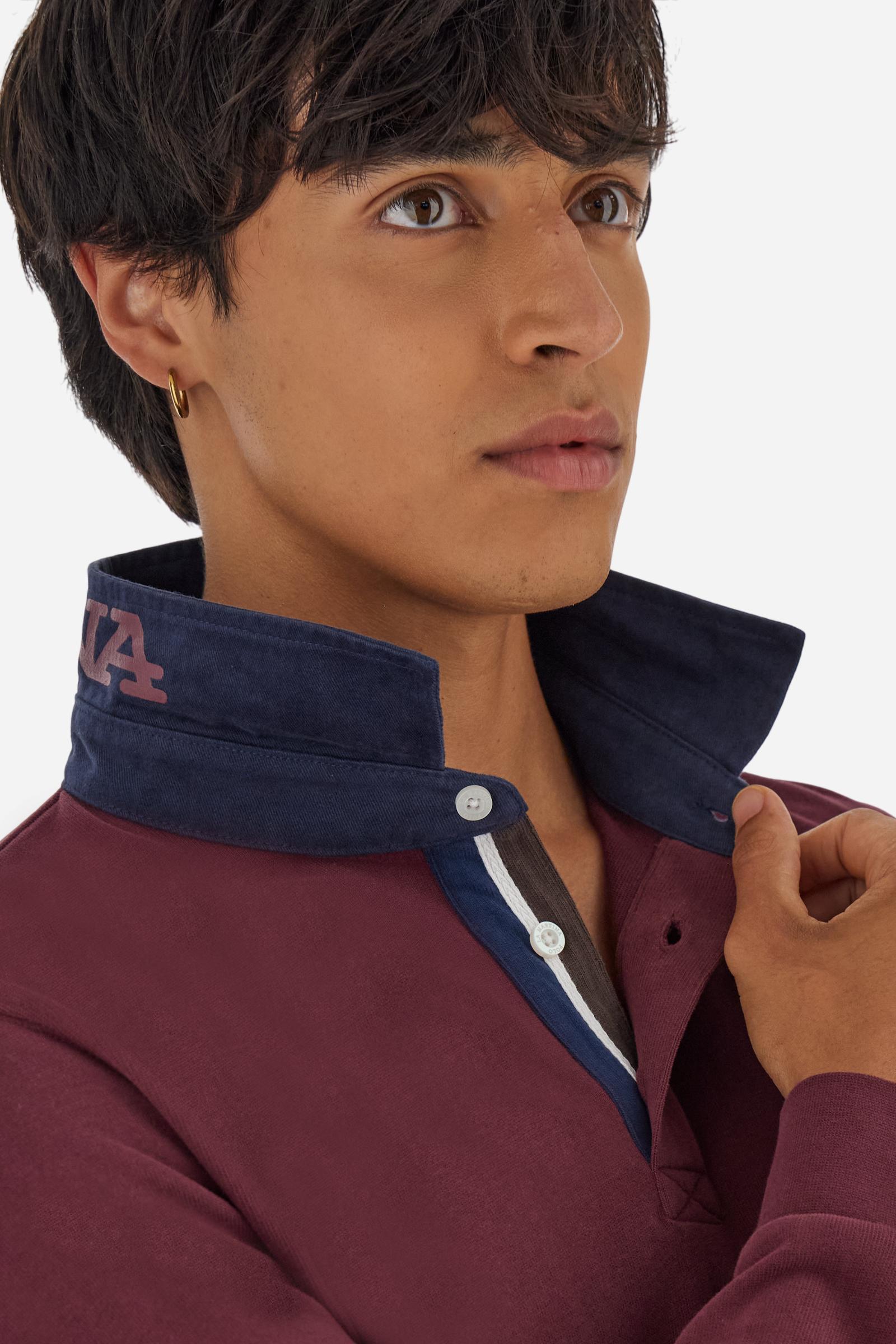 Classic men’s long-sleeve polo in soft-touch 100% cotton jersey. Contrast gabardine collar, three-button placket with multicolor striped tape. Iconic La Martina lettering printed in contrast under the collar. Small contrast logo embroidered on the chest. Regular fit for a balanced silhouette. Model wears size L. - Port Royale