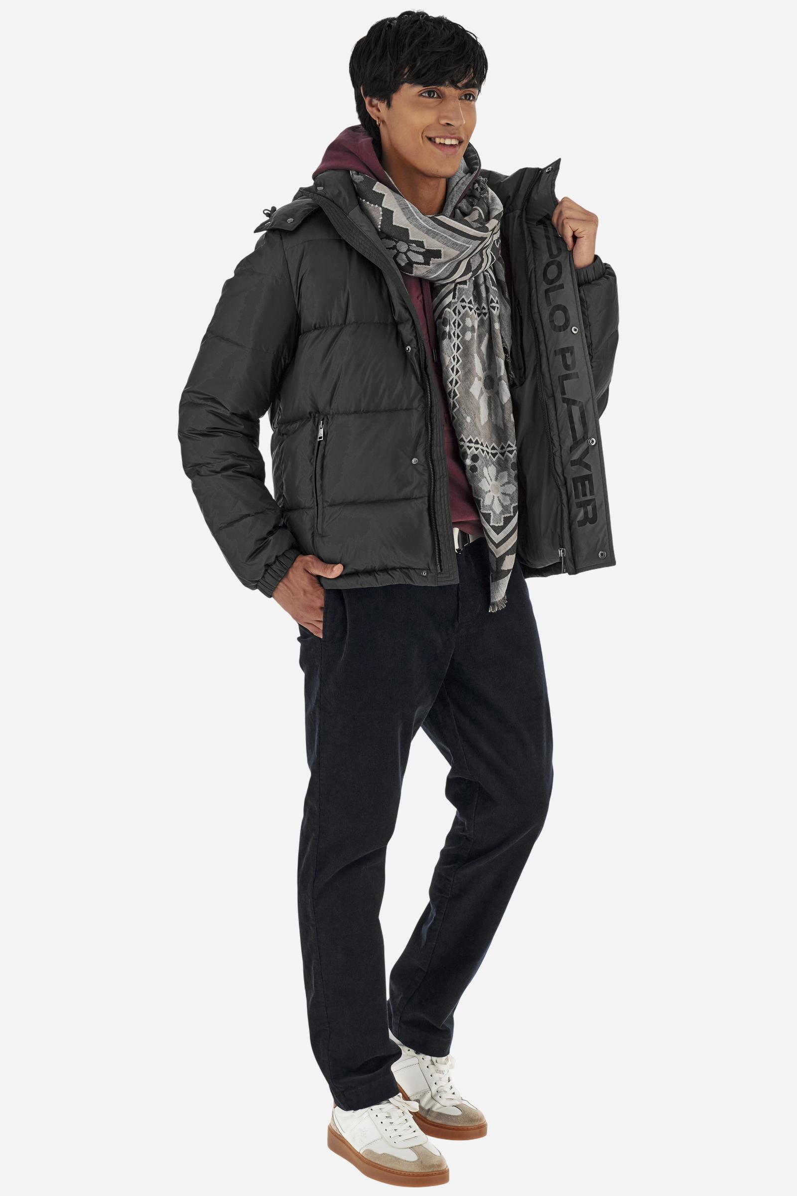 Men’s padded bomber jacket with detachable hood. Made of solid iridescent nylon with contrast lining. Equipped with two practical inner braces for extra comfort. Double customized zip front closure with inner placket featuring contrast Polo Player print, closed with metal snap buttons. Two vertical zipped pockets on the front. Hood with contrast lining and adjustable elastic drawstring. Bold Polo Player graphics printed inside. Regular fit for comfortable movement without bulk. Model wears size L. - Black