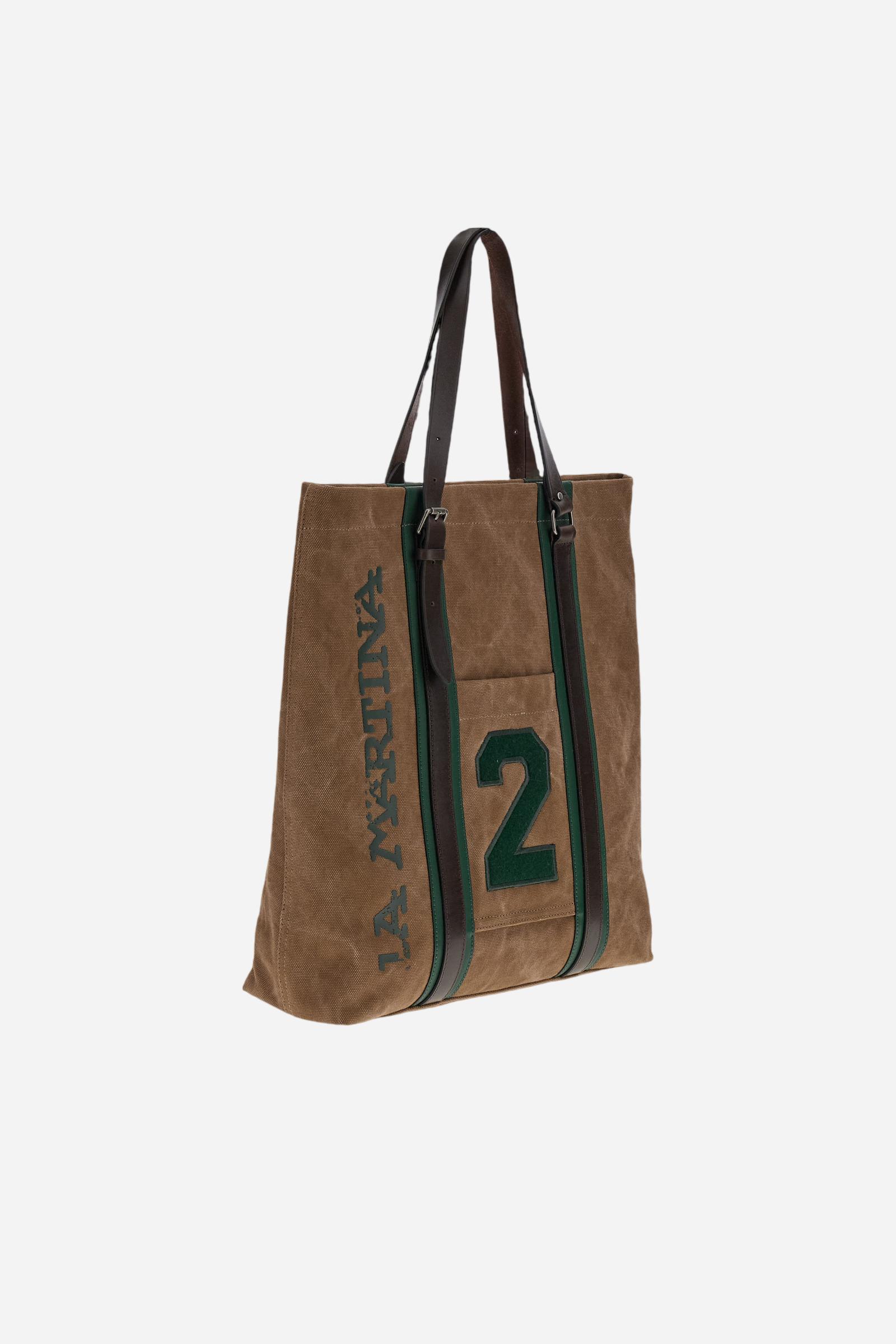 Tote bag in washed cotton and smooth leather. Versatile and roomy, with leather handles and front pocket with patch. - COCOA/PINE NEEDLE