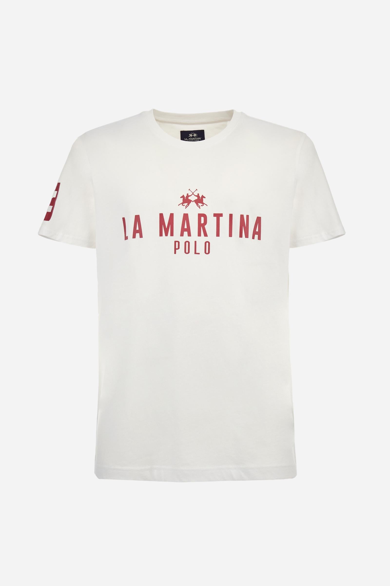 Men's single-colour crew-neck T-shirt with short sleeves, made of 100% cotton. The front features a printed logo and the lettering La Martina Polo. The number 3 is printed on one of the sleeves. Regular fit. The model is wearing a size L. - Opt.White/Honeysuckl