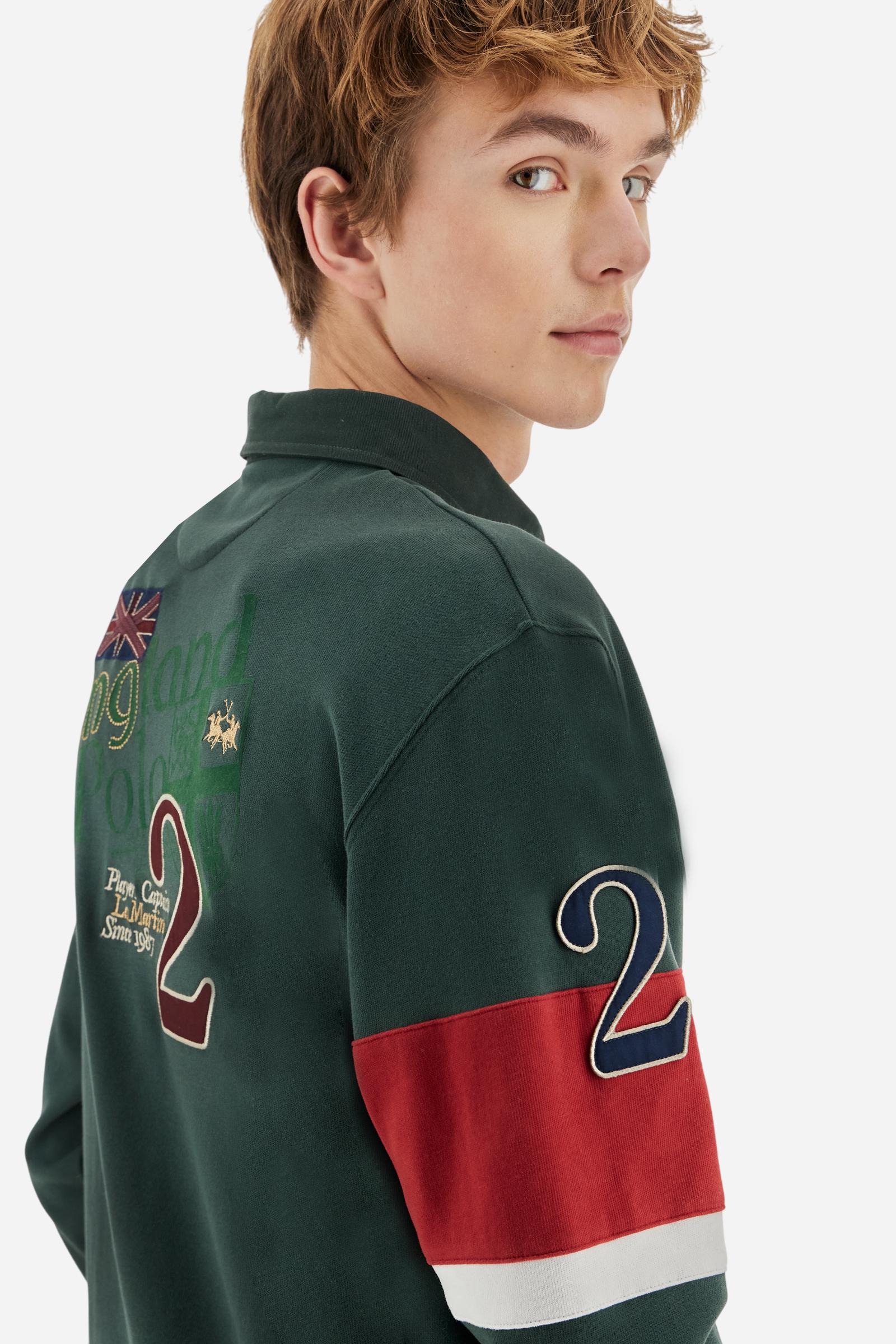 Long-sleeve polo shirt in 100% cotton jersey, soft and warm to the touch. Gabardine collar in tone with a contrast placket for a modern look. The English flag is printed under the raised right collar tip. Contrasting fabric bands and a patch with number 2 decorate the right sleeve, evoking polo player uniforms. Multicolor graphics dedicated to the English team and past special events enrich the design, with a large team logo embroidered in two-tone on the chest. Regular fit. Model wears size L. - Sycamore