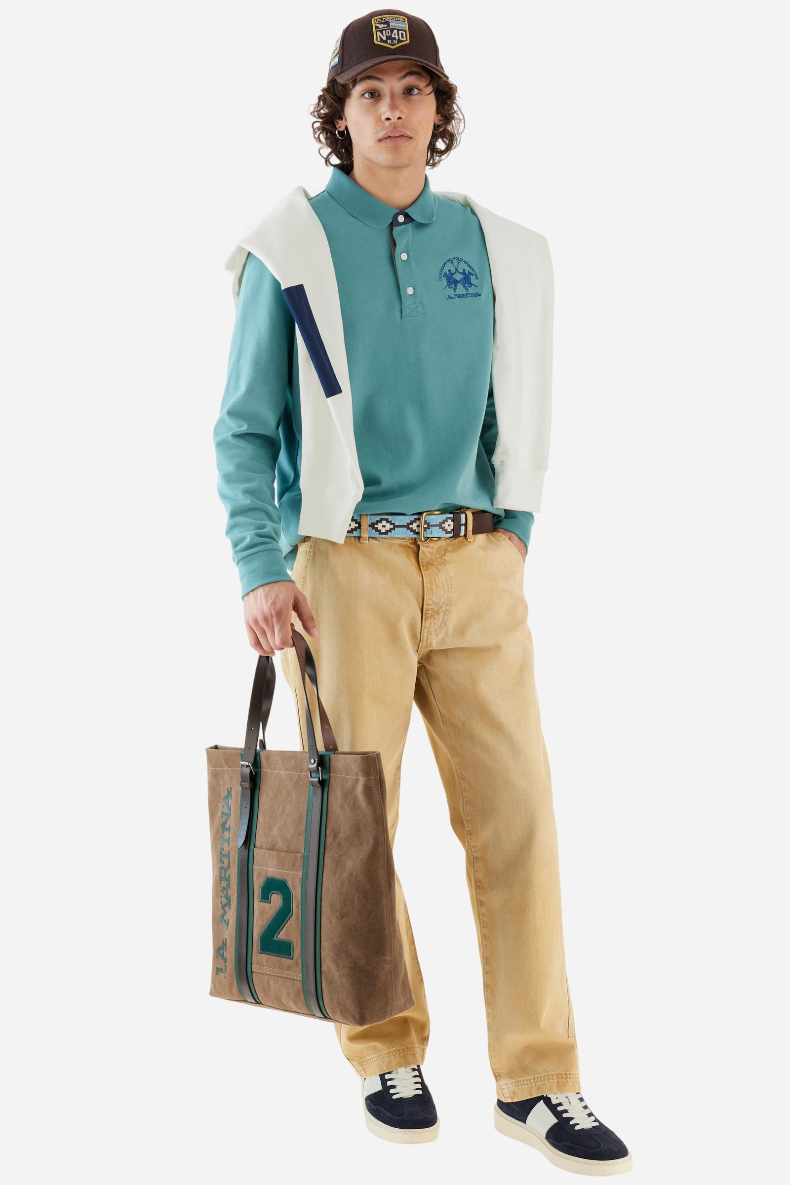 Men’s long-sleeve polo in premium soft-touch cotton jersey for a luxurious feel on the skin. Contrast gabardine details on the collar. Upper collar in tone-on-tone ribbing with printed La Martina lettering undercollar. Three customized buttons, enhanced by a multicolor striped tape on the placket. Contrast embroidered team logo on the chest. Regular fit. Model wears size L. - Sagebrush Green