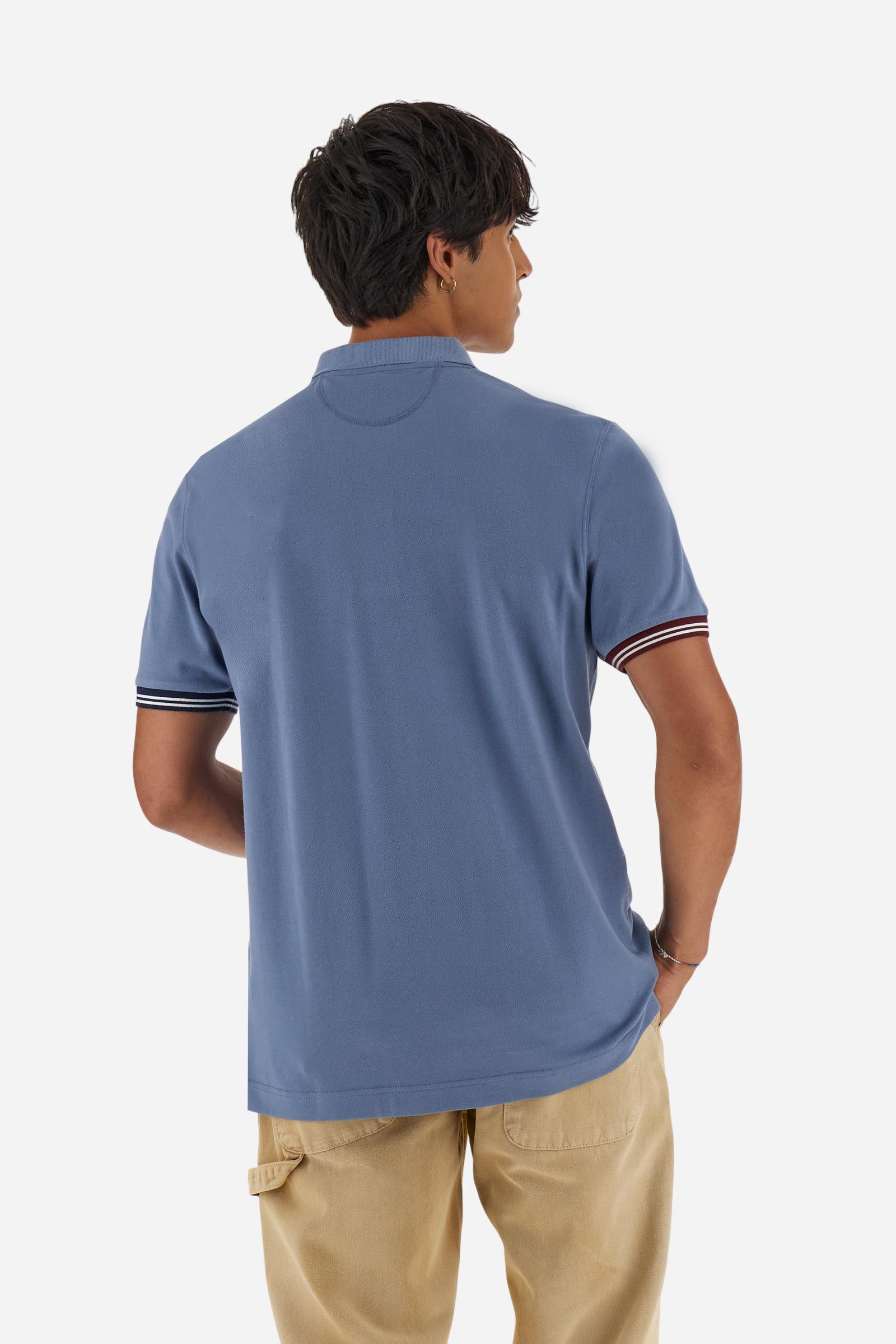 Men’s short-sleeve polo in high-quality stretch cotton piqué, ensuring excellent breathability and flexibility. Classic ribbed collar, two-button placket with customized buttons. Inner collar enriched with contrast tapes and colors for a modern touch. Multicolored ribbed cuffs with different patterns. Small contrast logo embroidered on the chest. Regular fit. Model wears size L. - Flint Stone