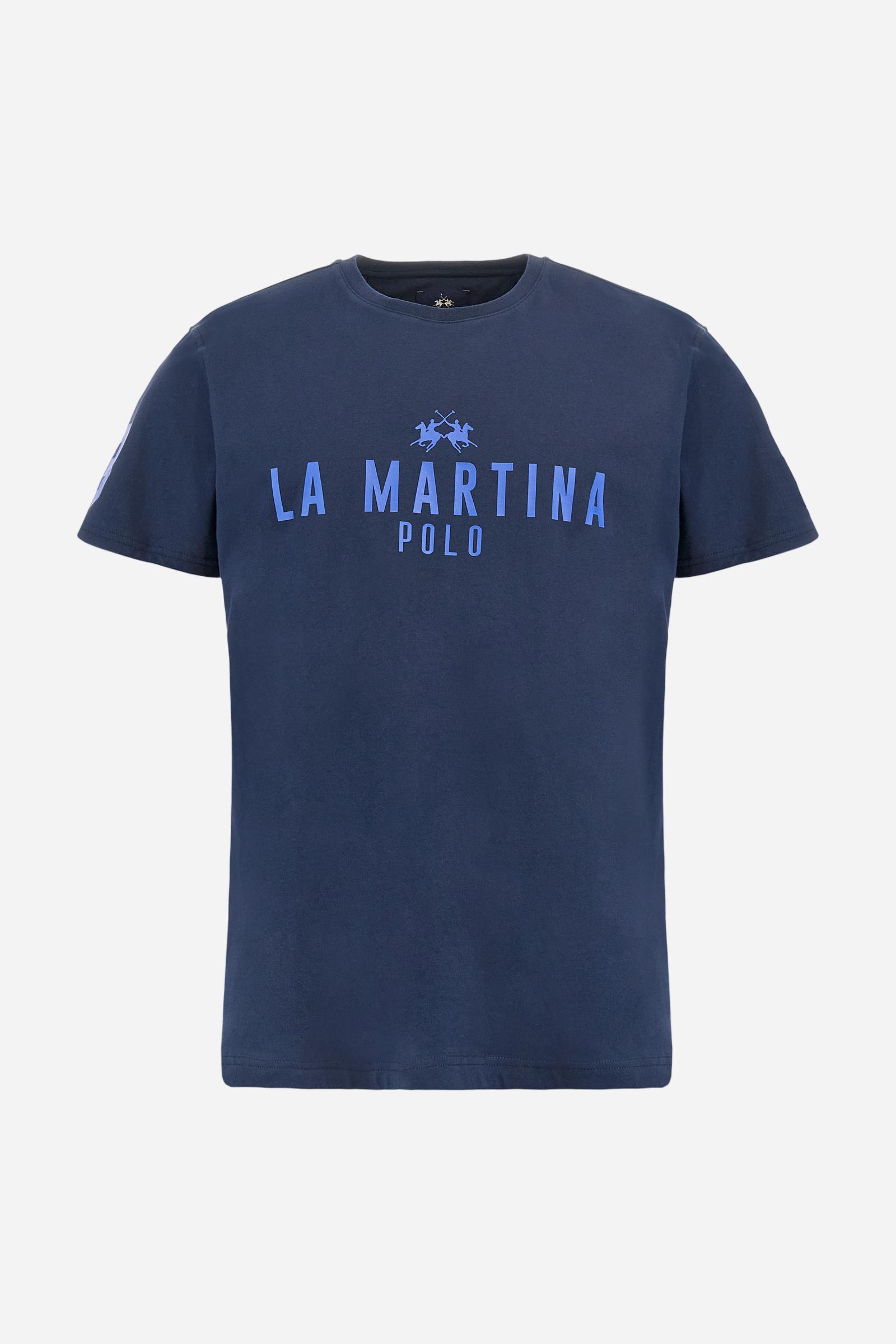 Men's single-colour crew-neck T-shirt with short sleeves, made of 100% cotton. The front features a printed logo and the lettering La Martina Polo. The number 3 is printed on one of the sleeves. Regular fit. The model is wearing a size L. - Navy