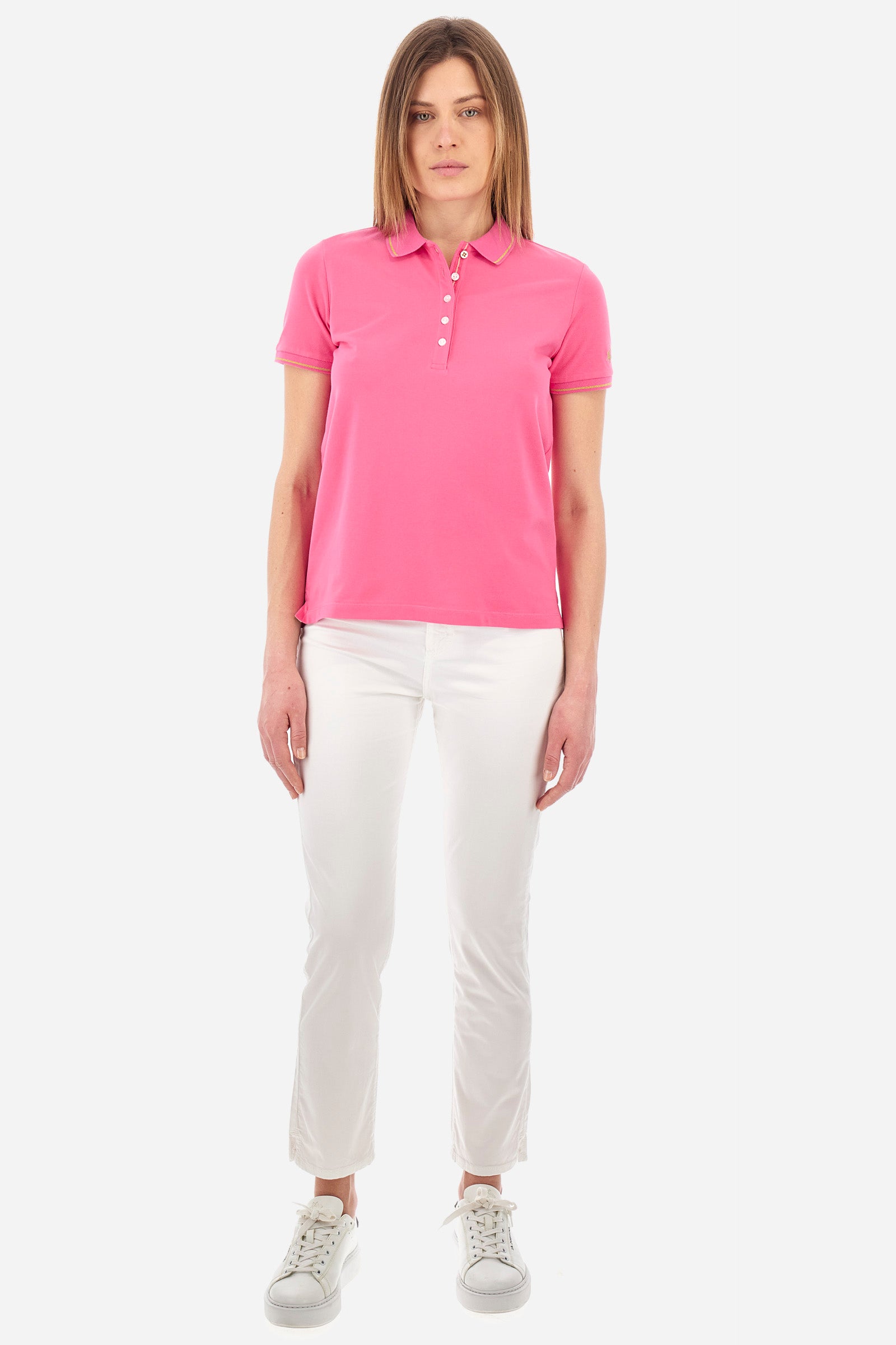 Women’s polo with short sleeves in solid color, made of stretch cotton. 5-button closure. Collar and crew sleeves profiled and ribbed. Side slits. Under the collar there is the inscription "La Martina". The logo is embroidered on a sleeve and embellished with the application of some rhinestones. The fit is regular. The model wears a size 2. - Hot Pink