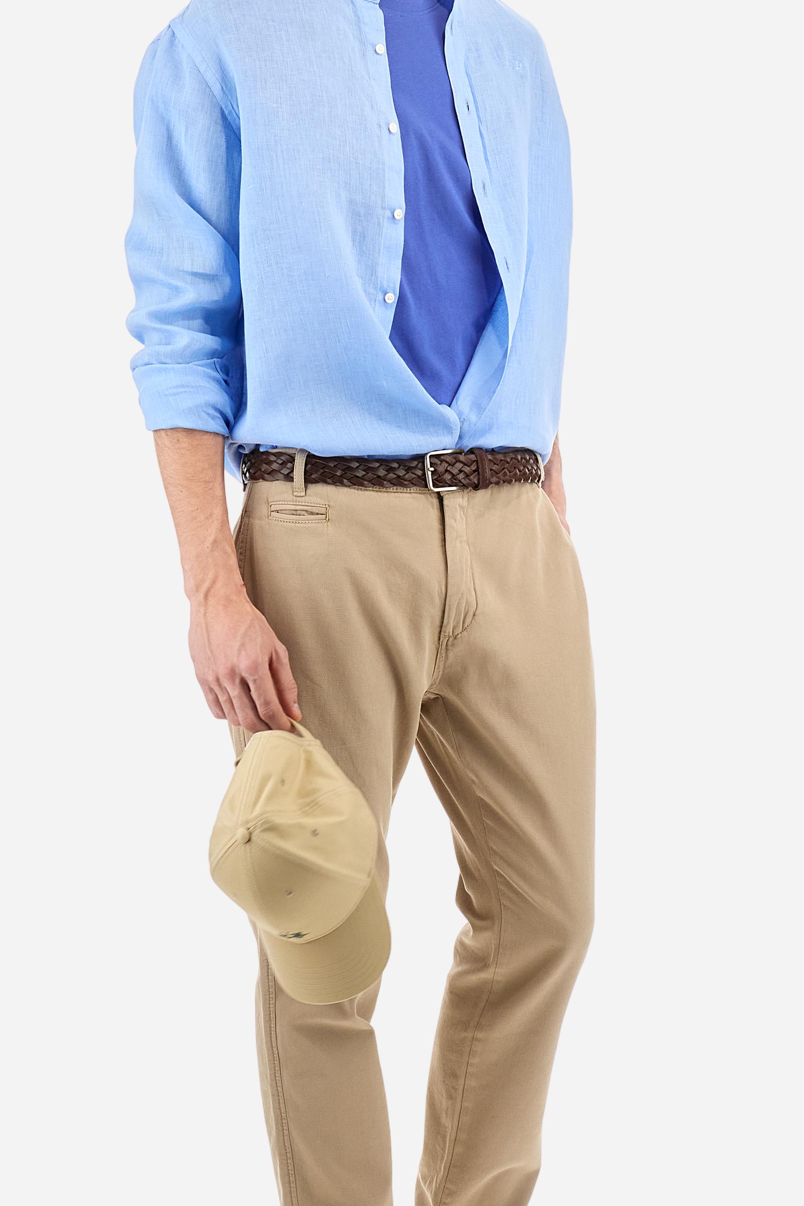 Men's plain cotton jersey short-sleeved T-shirt. Ribbed crew neck. On the front, left side, there is a two-tone embroidery inspired by the polo events played between Argentina and England. On the back, the printed graphic plays with the two flags, celebrating the Dubai and La Martina polo teams with contrasting coloured writing. The logo is embroidered on the left side of the chest in contrasting thread. Regular fit. The model is wearing a size L. - Dazzling Blue