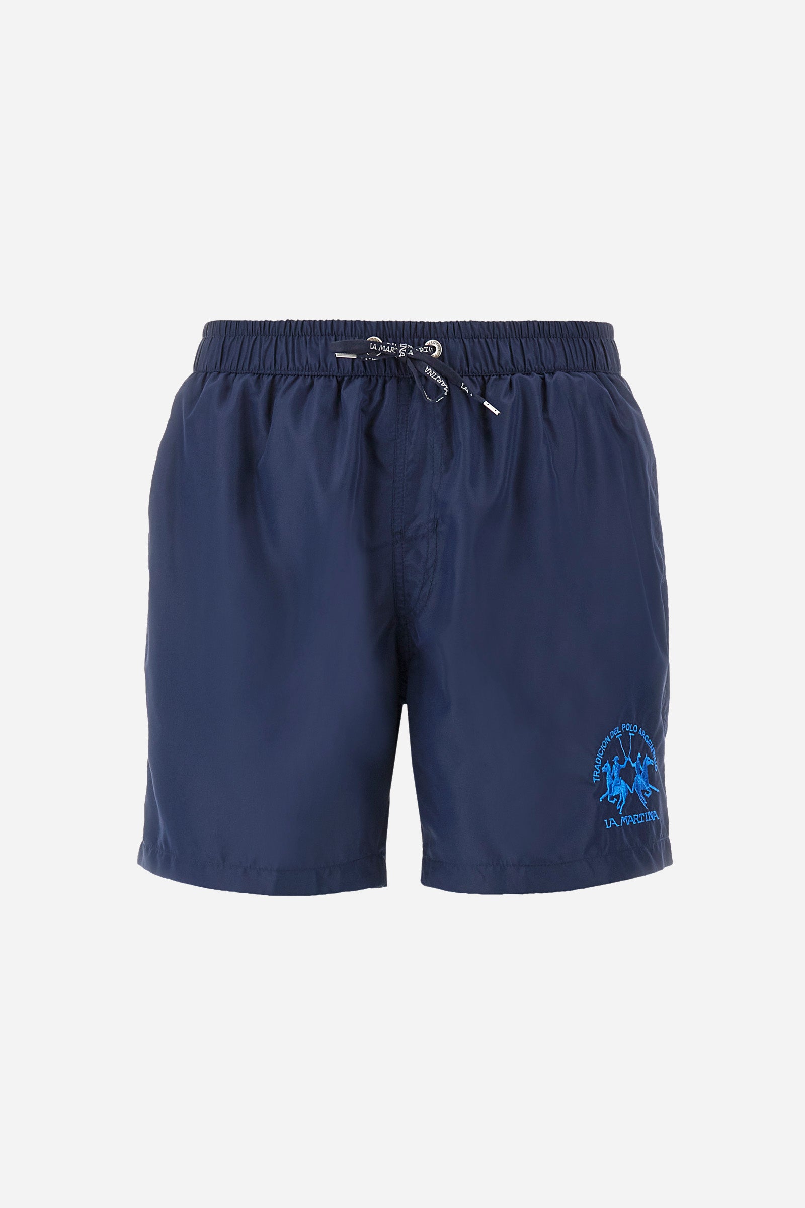 Single-colour men's swimming shorts, made of synthetic fabric. Featuring a drawstring and tie with "La Martina" lettering. Double welt pocket on the front. Closed pocket on the back. Mesh lining. Large logo embroidered on the front. The fit is regular. The model wears a size L. - Navy