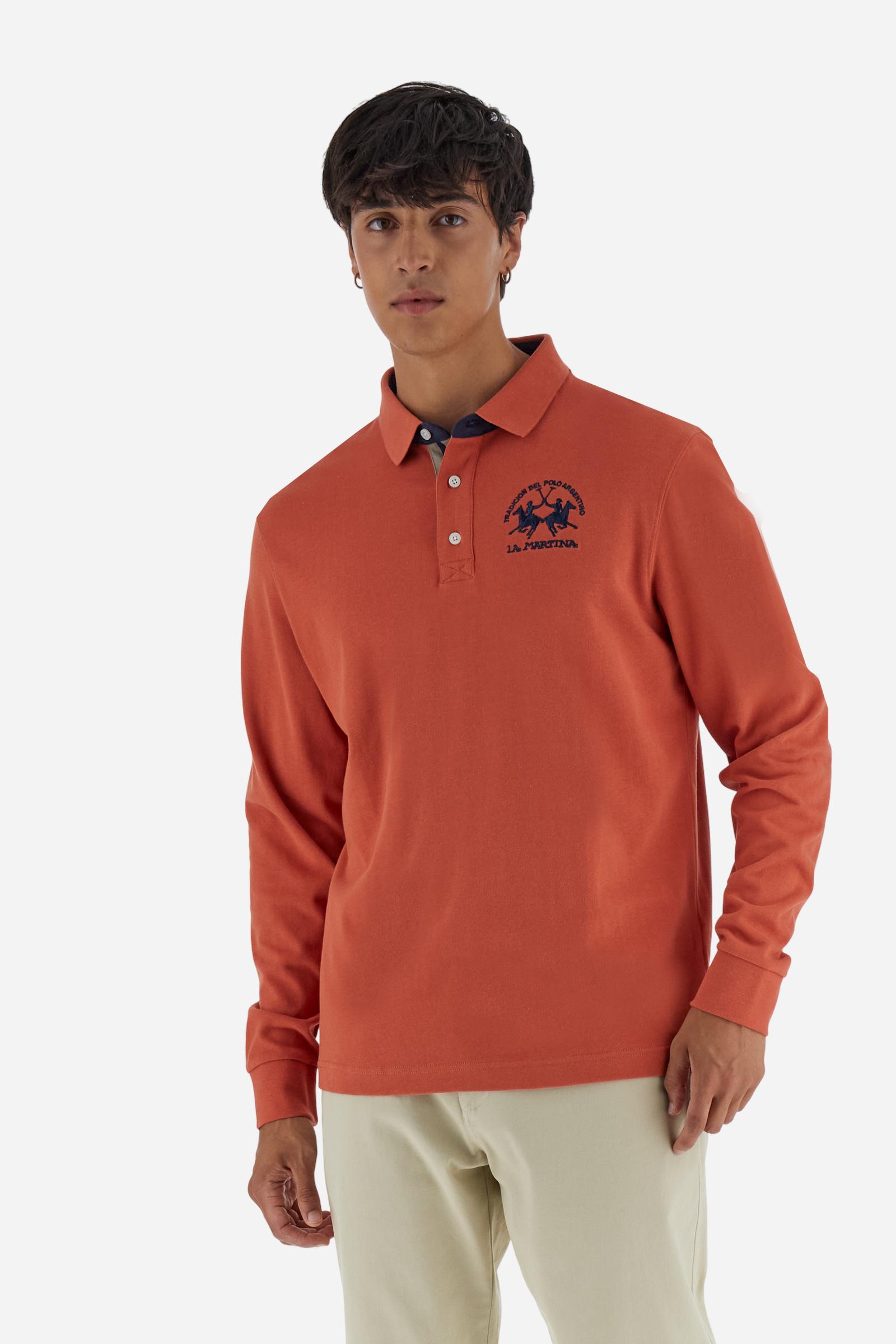 Men’s long-sleeve polo in premium soft-touch cotton jersey for a luxurious feel on the skin. Contrast gabardine details on the collar. Upper collar in tone-on-tone ribbing with printed La Martina lettering undercollar. Three customized buttons, enhanced by a multicolor striped tape on the placket. Contrast embroidered team logo on the chest. Regular fit. Model wears size L. - Burnt Ochre