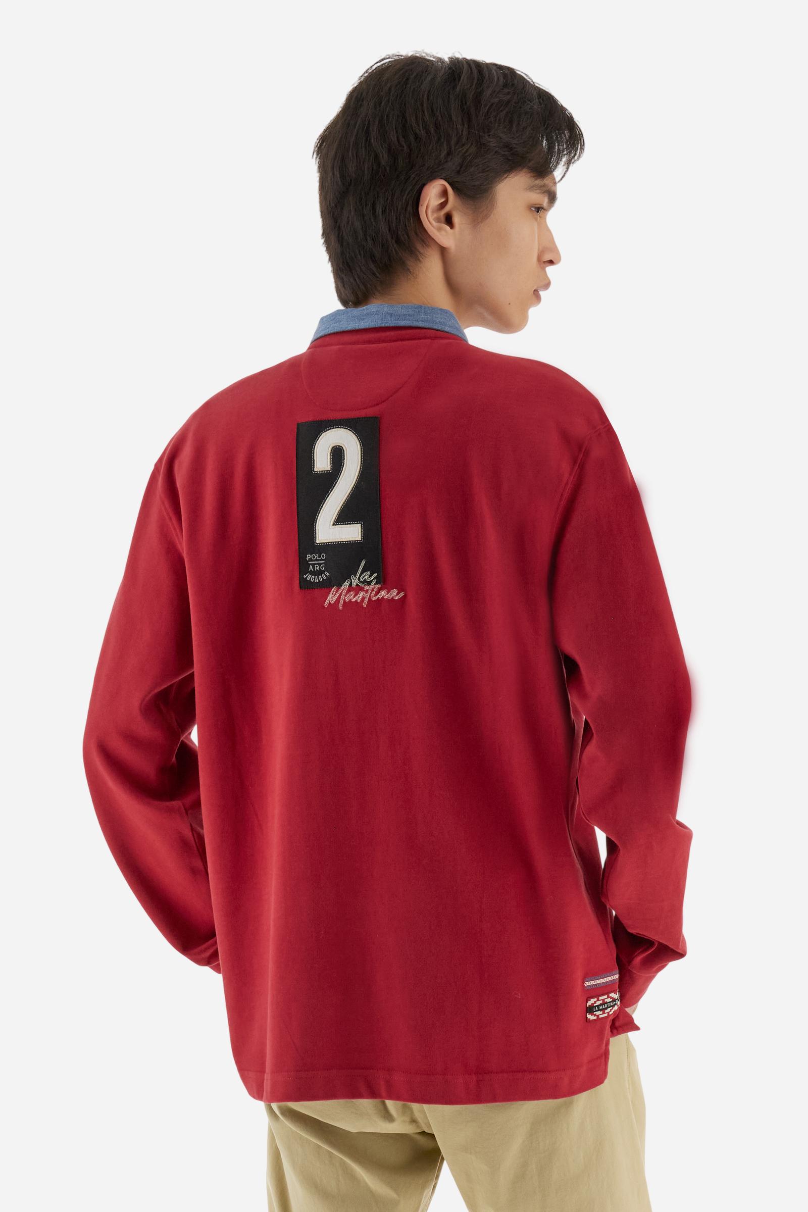 Men’s long-sleeve polo shirt in solid-colour cotton jersey with a warm touch. Contrast details on collar and three-button placket with mixed fabrics and colours. Patches and embroidery celebrate the Asociación Gauchos Argentinos. Small embroidered logo on the chest integrated with other graphics. Regular fit. The model wears size L. - Chili Pepper