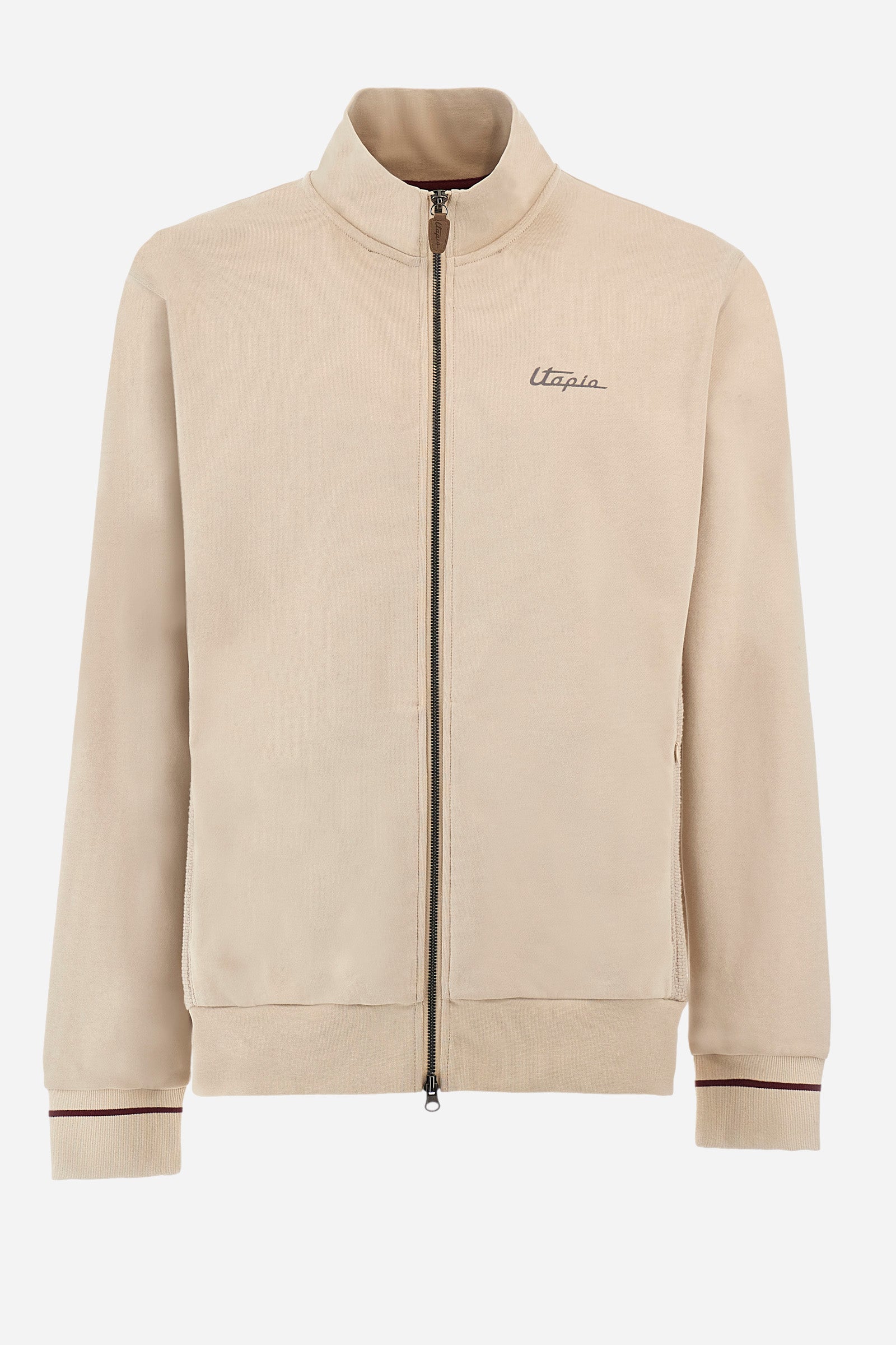 Single-colour long-sleeved men's sweatshirt with full zip fastening from the line in collaboration with Pagani. Made of 100% cotton. Mock neck, ribbed waistband and cuffs. Double back pocket. On the sides the garment has a different texture from the main part. There is lettering on the front, while a plate featuring the La Martina logo and the Pagani logo is sewn on the back. The fit is regular. The model wears a size L. - Rainy Day