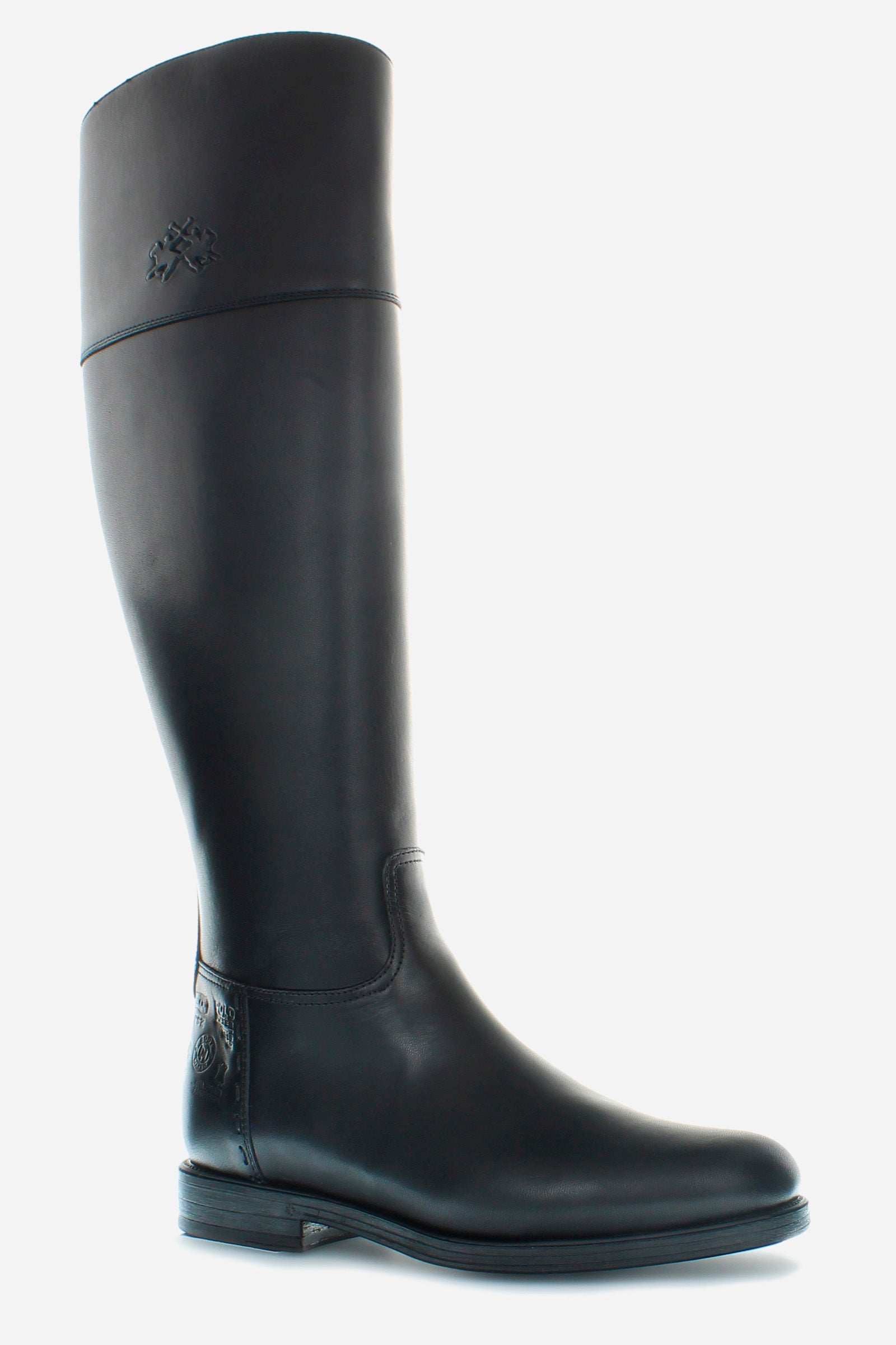 Equestrian-inspired women's boot in soft cowhide with a clean style.An emblematic model with the unique savoir-faire of La Martina. The horse logo is embossed on the side upper leg. Customised metal rivet detailing on the lower side. This is complemented by the craftsmanship of the hand-stitching. With an extremely versatile and current country chic style. - BLACK