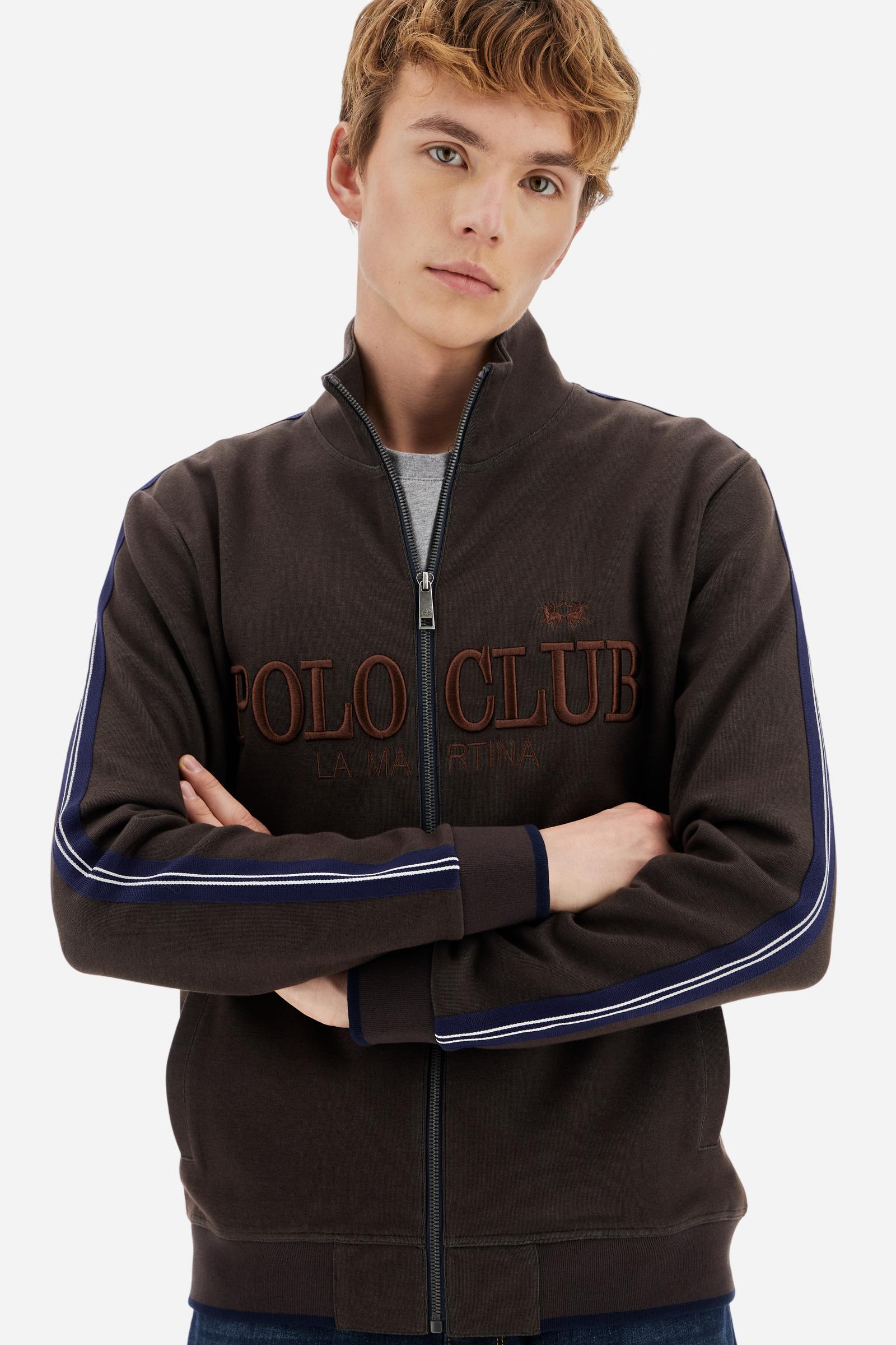 Men's long-sleeved, full-zip sweatshirt. Made of soft solid colour cotton fleece. The neck and cuffs and waistband are in solid colour ribbed knit with contrasting edging. Front zip opening and Polo club guarantee label applied to the edge inside the collar. The front lettering is a large tone-on-tone raised embroidery. A narrow two-tone striped band is applied to the shoulders and sleeves. Regular fit. The model is wearing a size L. - Java