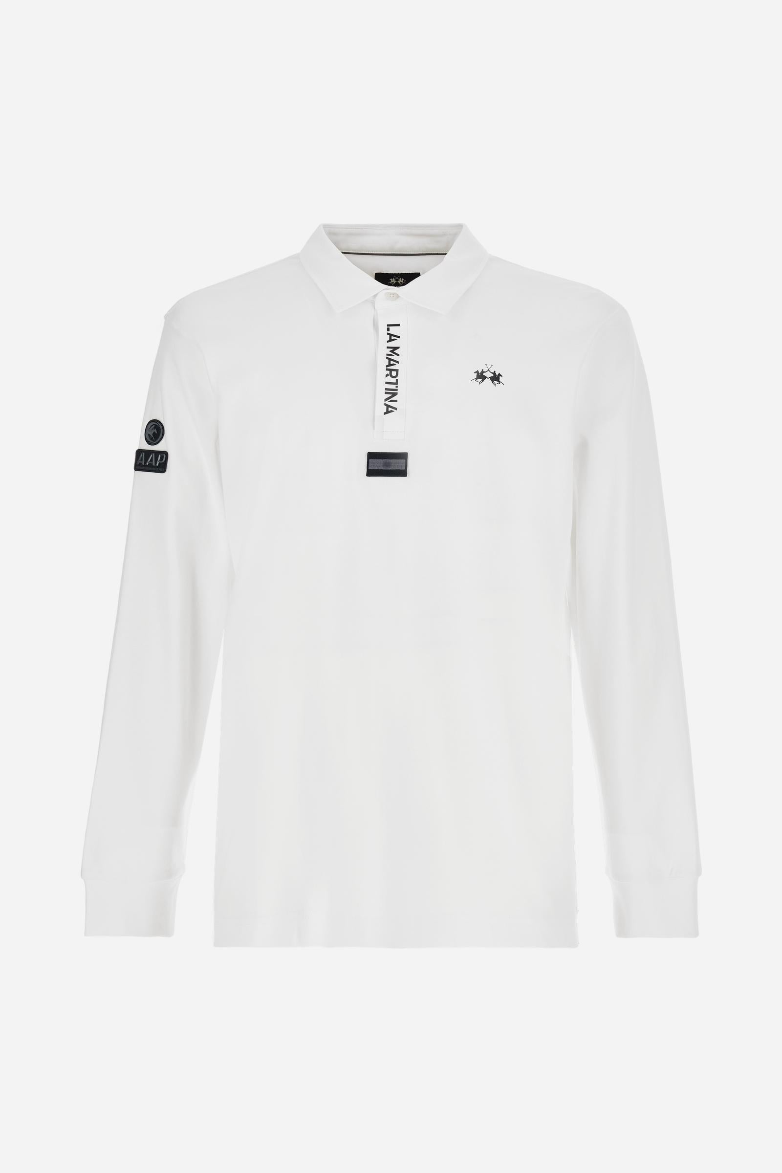 Premium men’s long-sleeve polo shirt in 100% cotton jersey with a smooth, silky texture. Hidden button placket and vertical contrast print. Patches dedicated to the Asociación Argentina de Polo (AAP) on the sleeve and below the opening. Small semi-transparent contrasting logo printed on the chest. Regular fit. The model wears size L. - Optic White